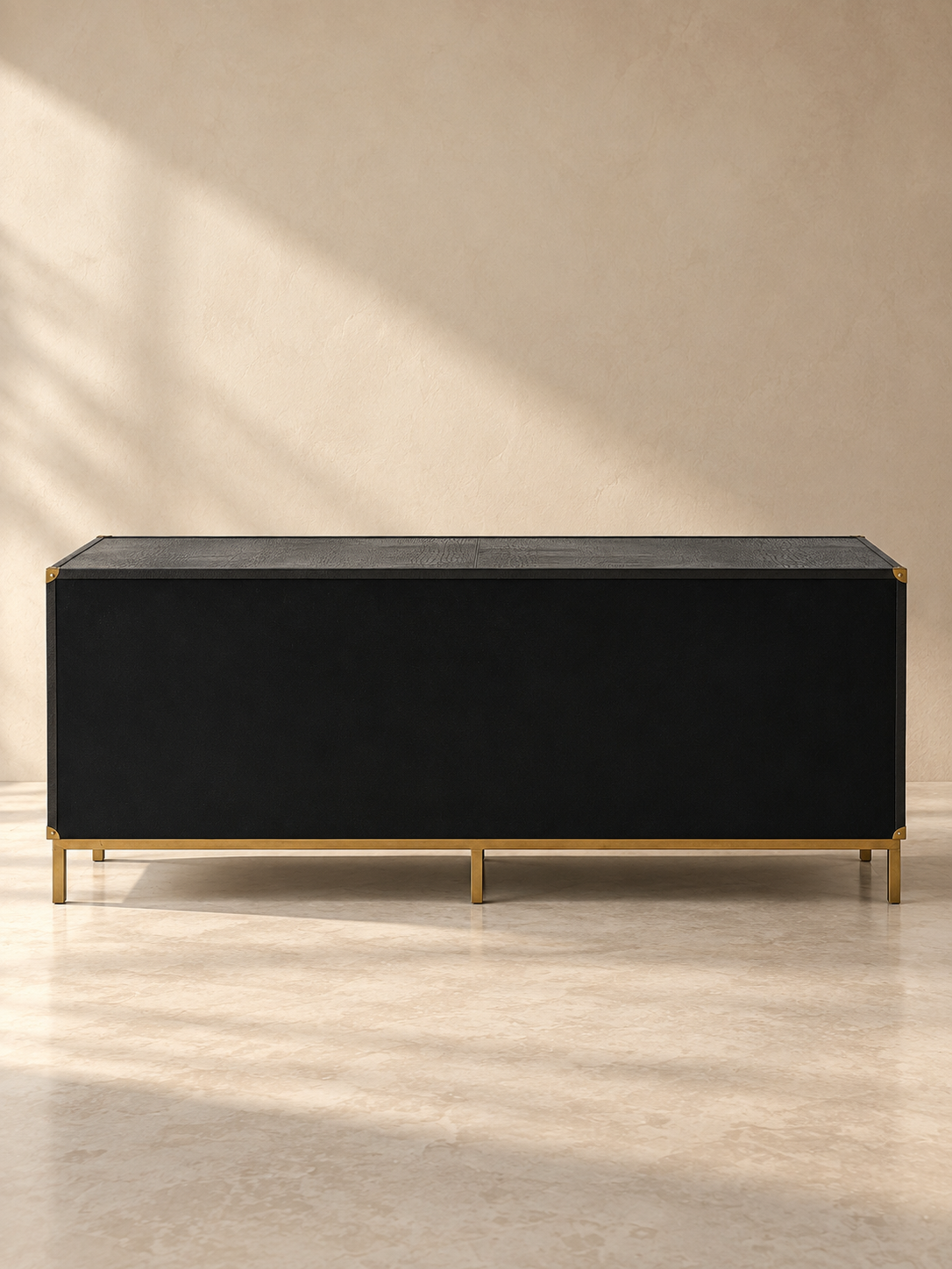 Finished back of the Pataudi black leather chest of drawers, made to stand away from a wall — Art Avenue