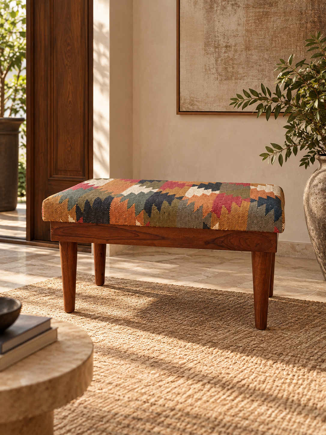 Almora Kilim Bench in an entrance hall beside a carved wooden door, vintage kilim upholstered seat — Art Avenue
