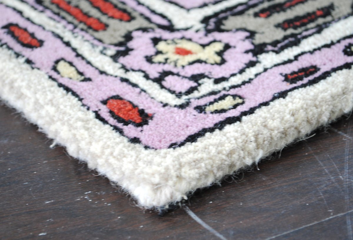 Ajmer hand-tufted wool rug with ivory, cobalt and lilac medallion