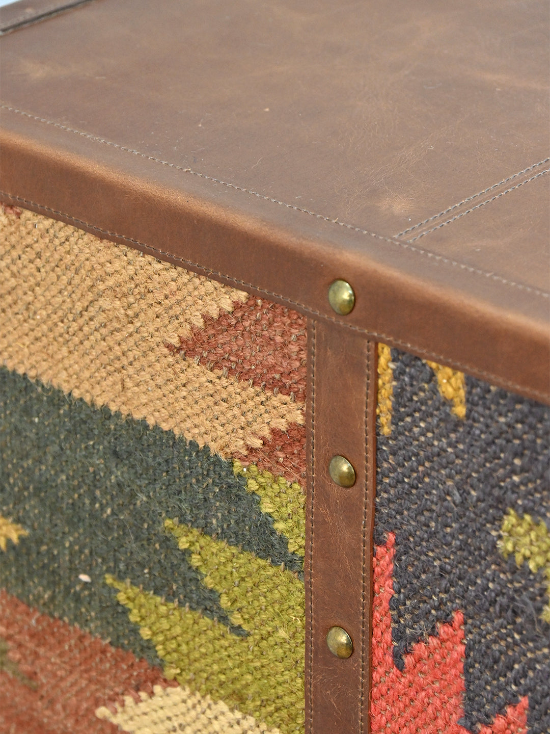 Detail of the studded leather batten between vintage kilim panels, Fatehpur sideboard, Art Avenue