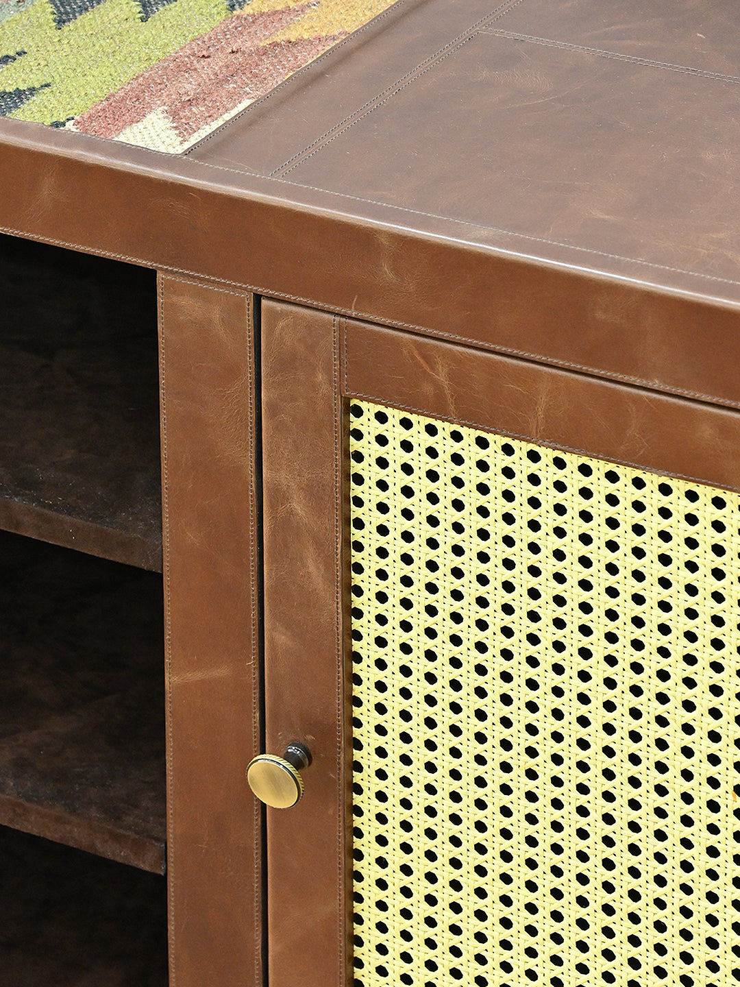 Detail of the leather top edge, cane door and brass knob, Fatehpur sideboard, Art Avenue