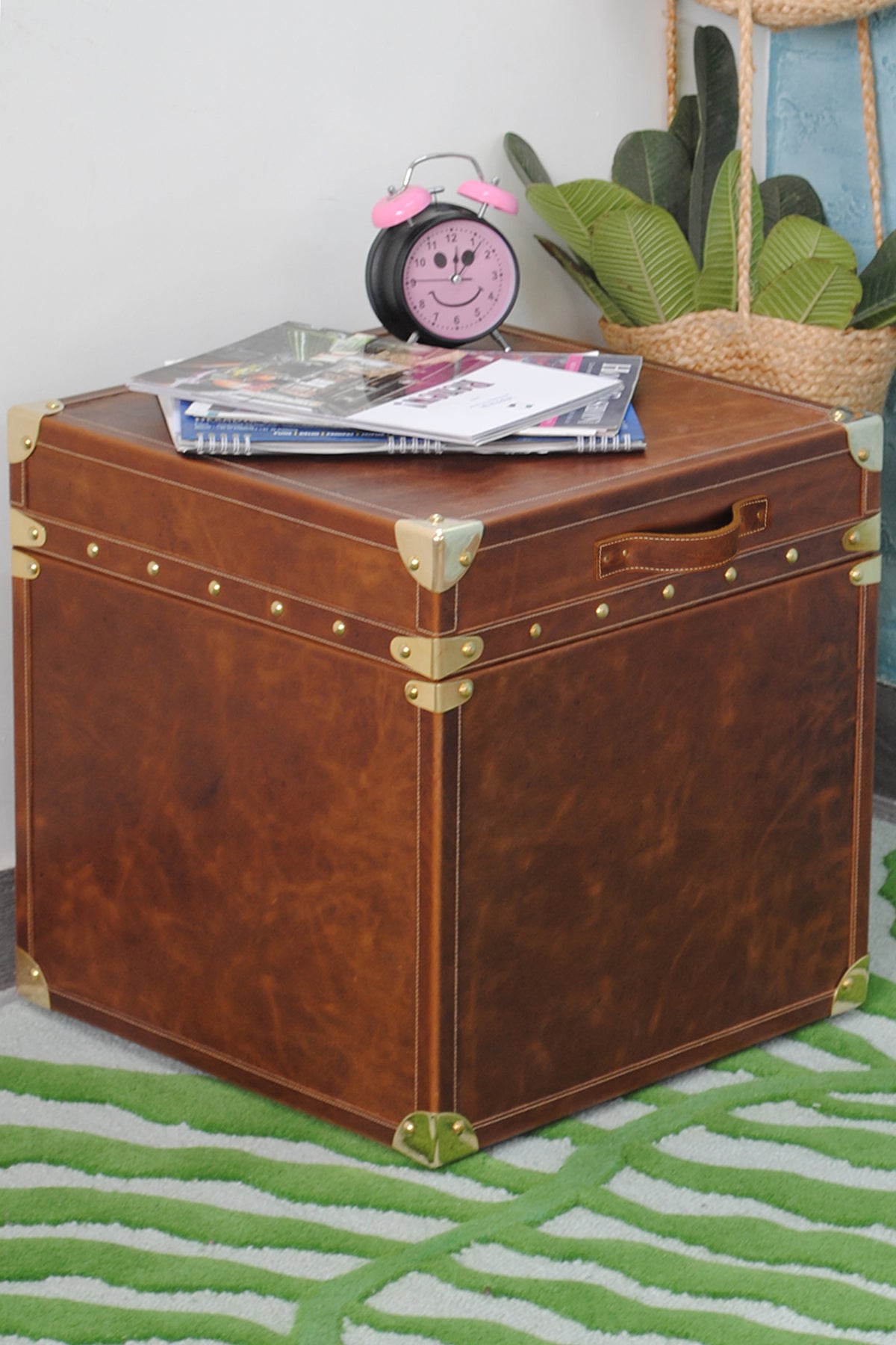 Cordoba Leather Cube Trunk used as a bedside table, three-quarter view