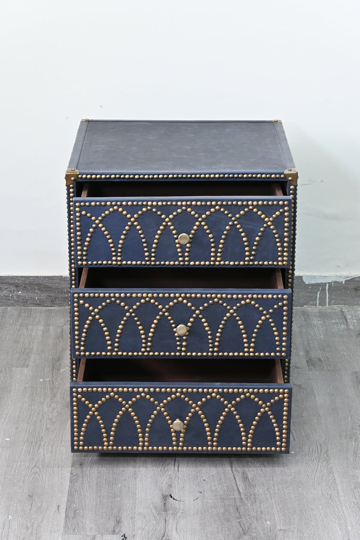 Samode bedside chest with all three drawers open, showing the lined interiors