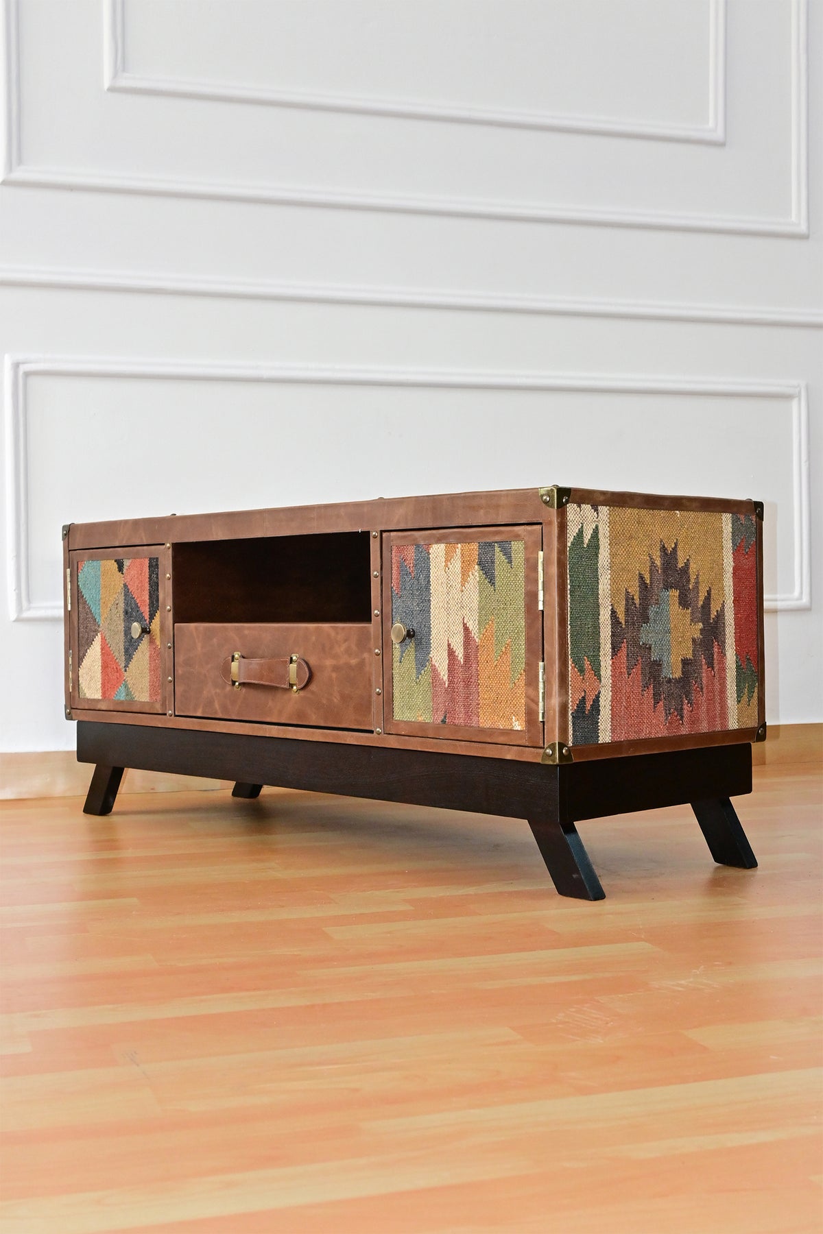 Karauli TV unit from the right, showing the medallion-pattern kilim flank