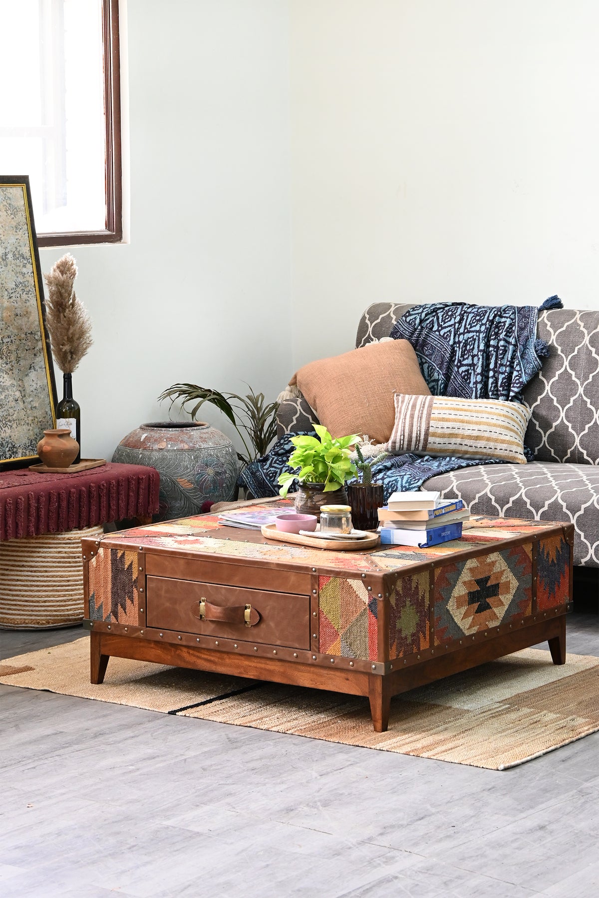 Mandawa kilim trunk coffee table styled in a living room with grey sofa and jute rug