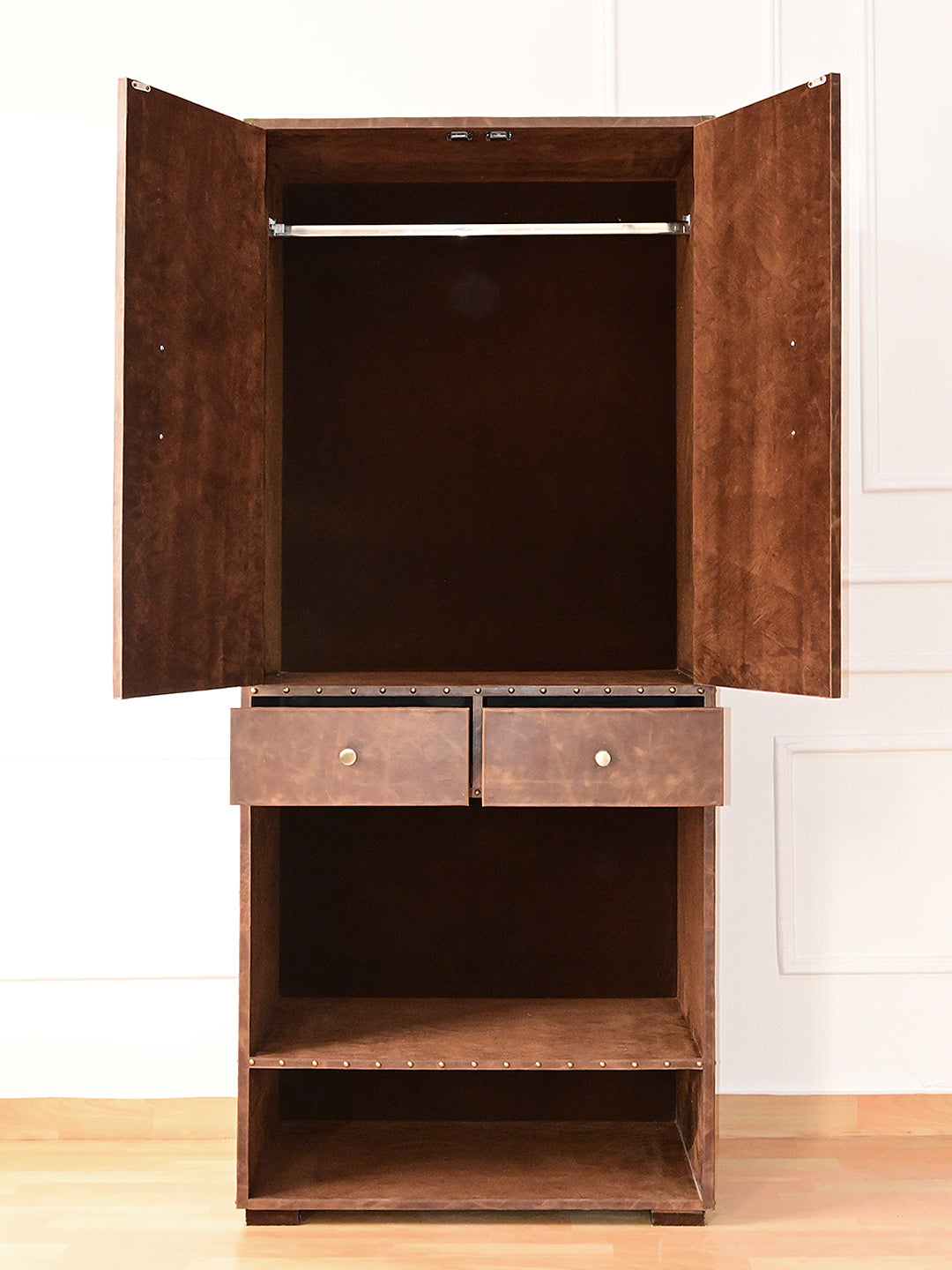 Alsisar wardrobe open, showing the suede-lined hanging compartment and both drawers pulled out