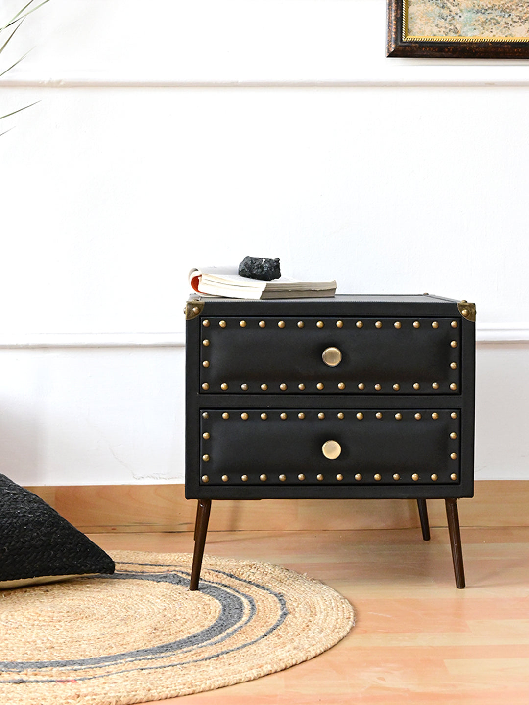 Kishangarh bedside table in Onyx leather styled on a jute rug with a book, Art Avenue, made to order