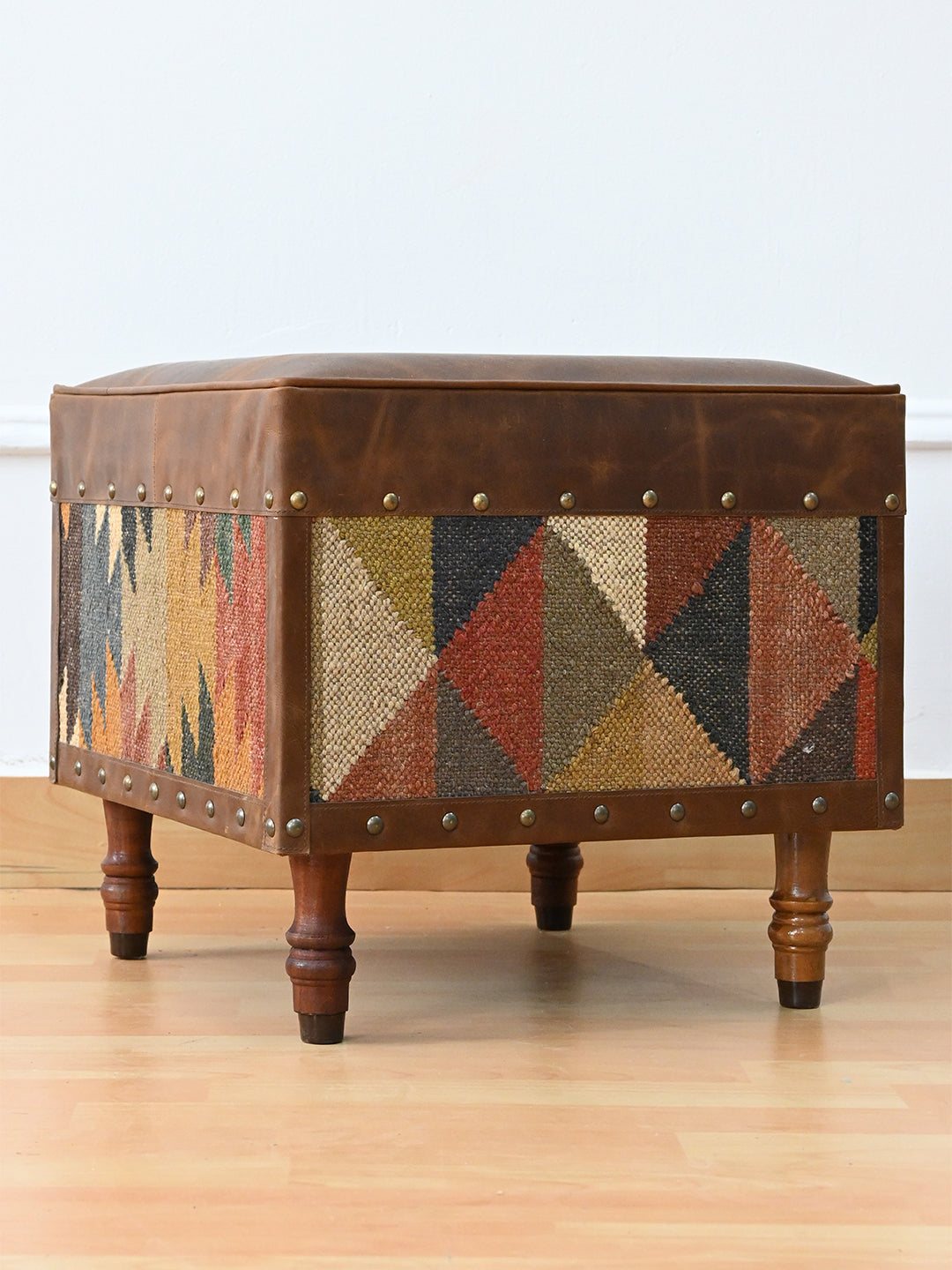 Dundlod ottoman by Art Avenue from the opposite corner, contrasting vintage kilim panels on each face