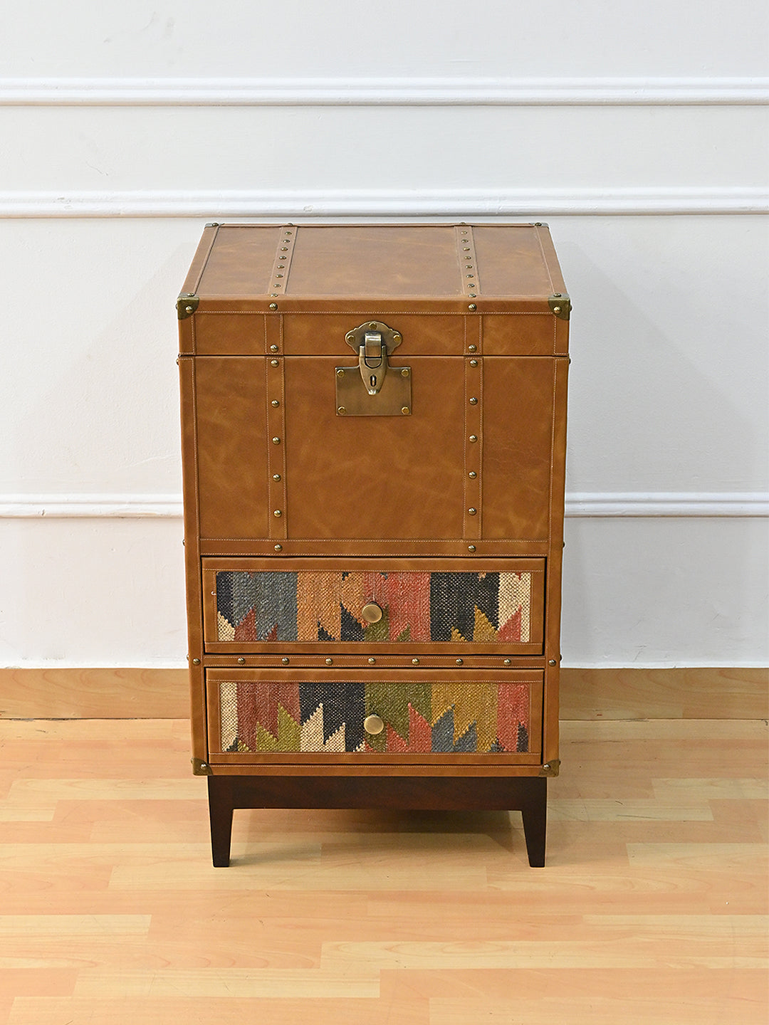 Osian kilim and leather drawer trunk photographed front on with the lid closed. Art Avenue, made to order.