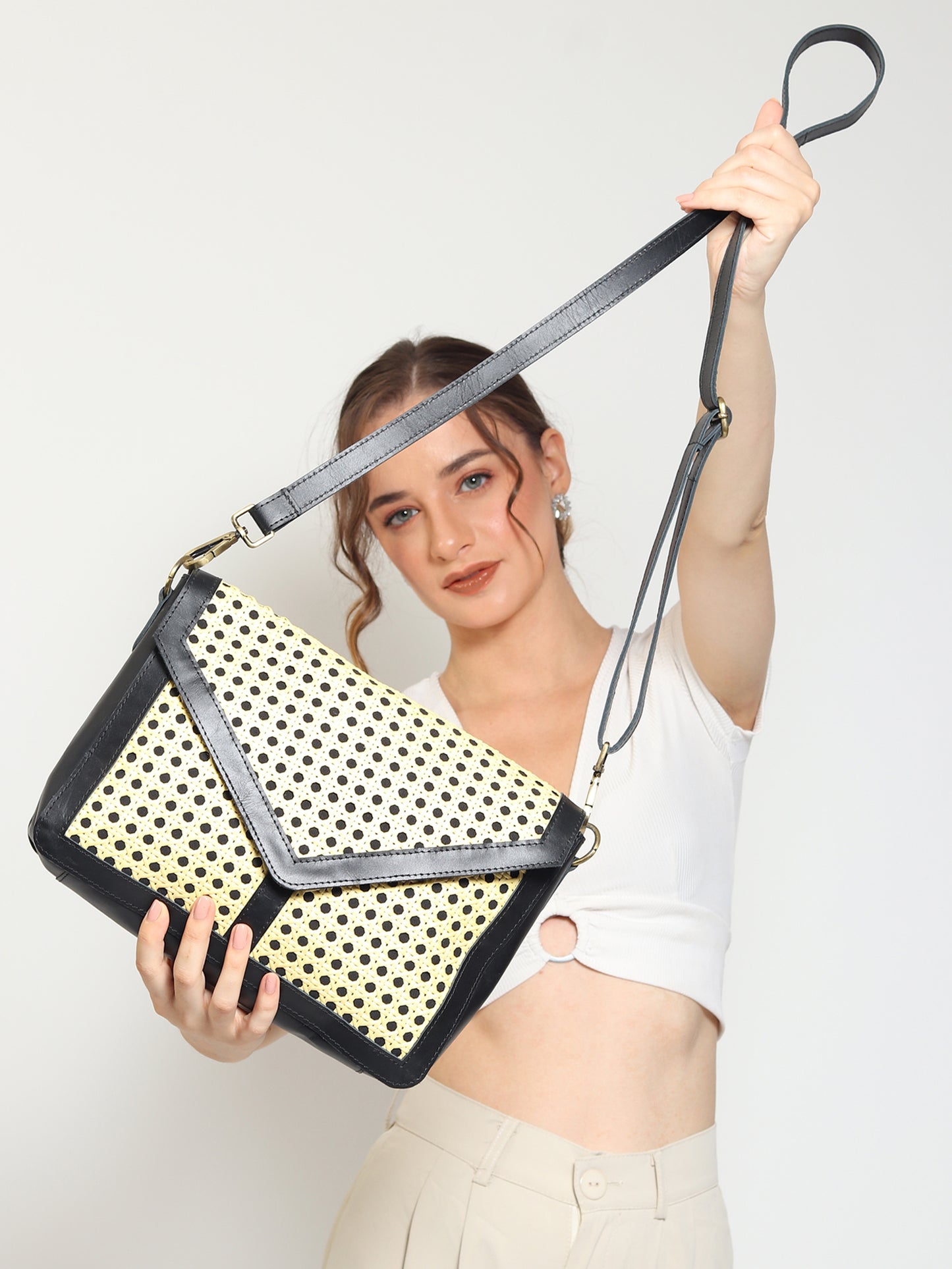 JAYLEN - CANE & LEATHER SLING BAG