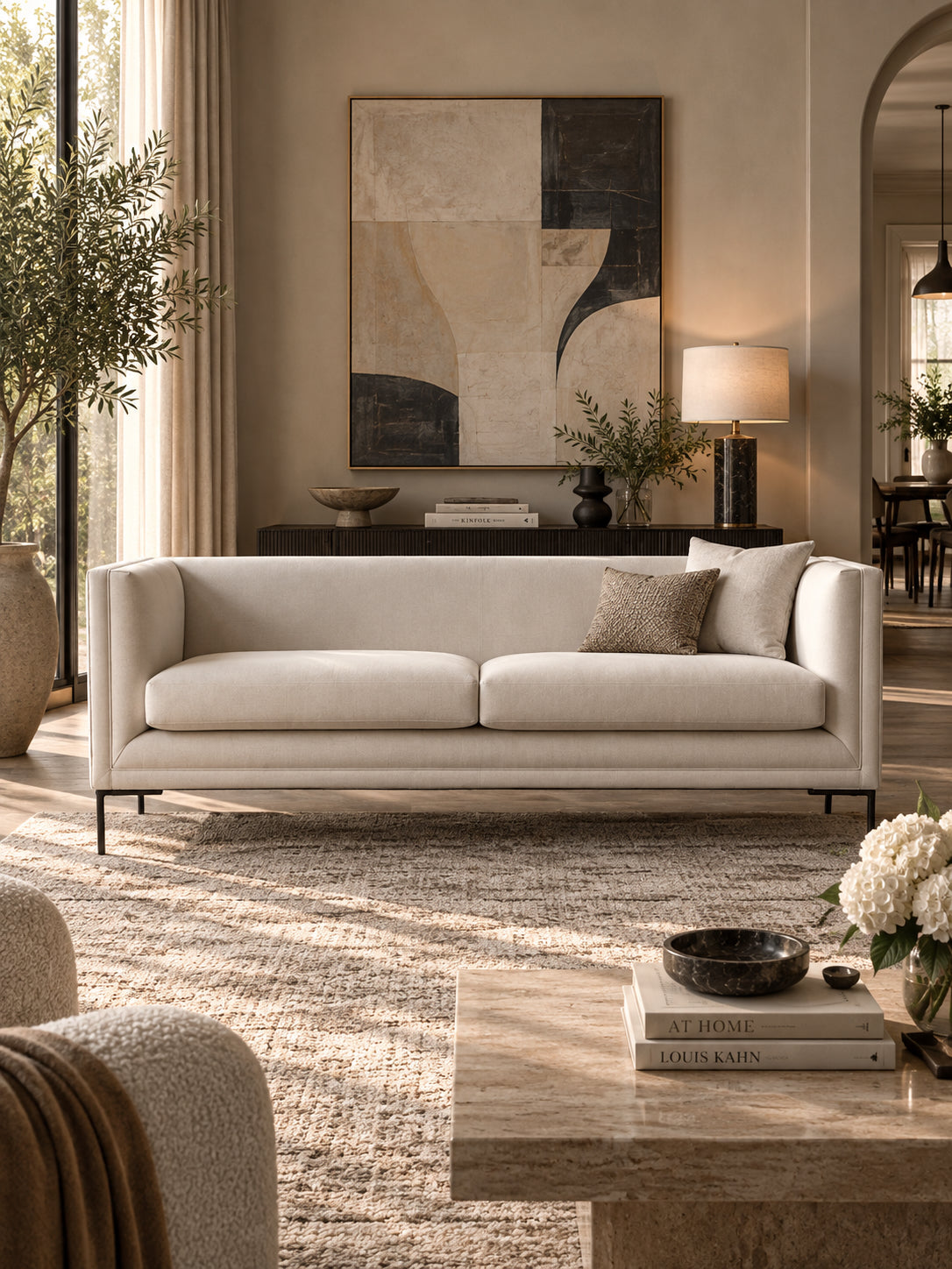 Mayfair Fabric Tuxedo Sofa — clean tuxedo line with arms level to the back, piped upholstery and two loose seat cushions on slim metal legs. Art Avenue, made to order.
