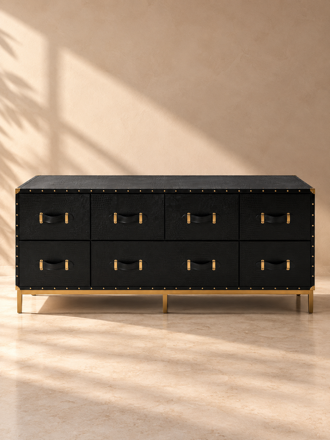 Pataudi studded leather chest of drawers in black croc-embossed leather on a brass-finished base, front view — Art Avenue, handmade to order