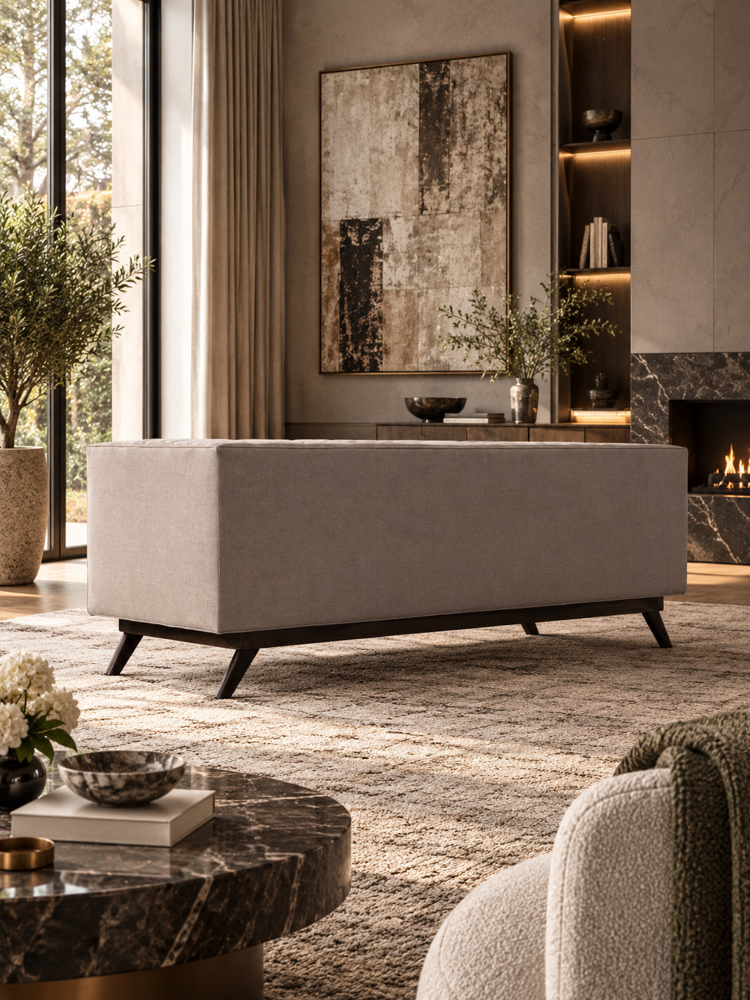 Kingston buttoned fabric sofa by Art Avenue — two loose seat cushions on a plain deck with a cast brass Art Avenue plate set into the outside arm, handcrafted to order — image four of five