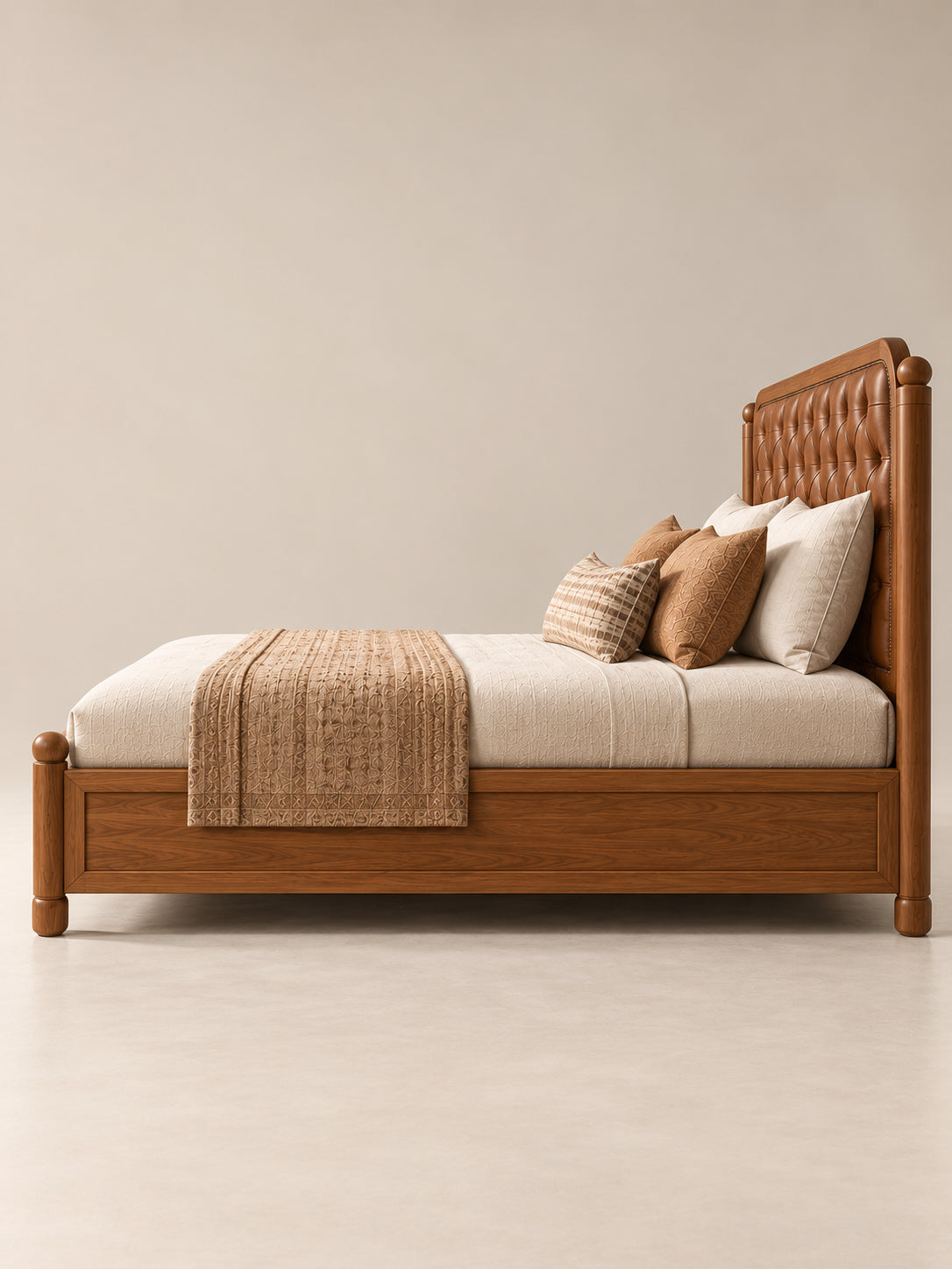 Dalhousie Buttoned Leather Bed in side profile — buttoned leather headboard between turned posts, framed-panel side rail and turned rounded feet. Art Avenue, made to order.