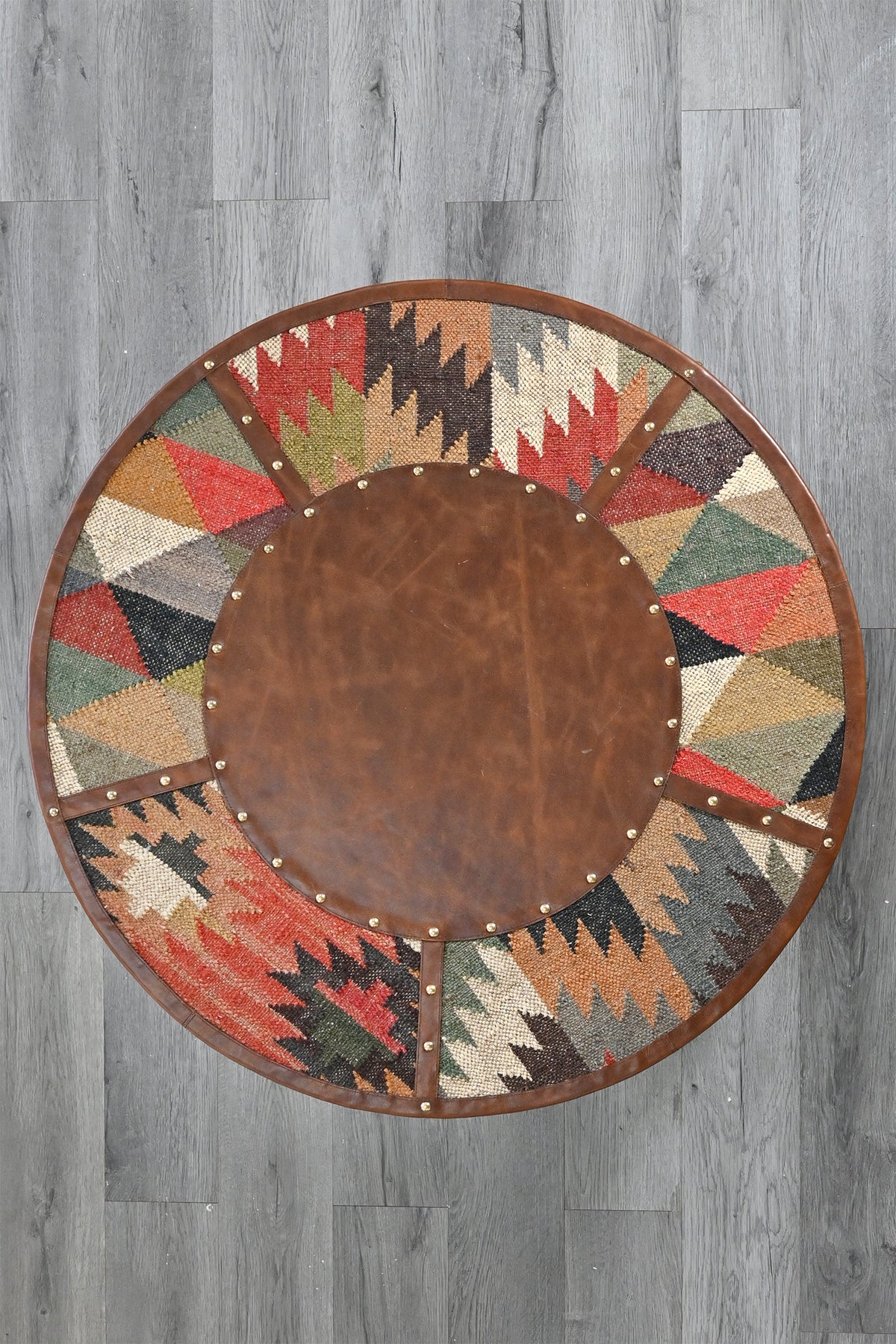 Goround round coffee table in kilim and leather by Art Avenue — image 10 of 11