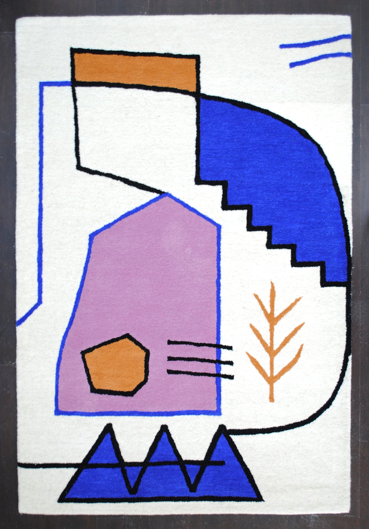 Hampi hand-tufted rug in 100% New Zealand wool, full overhead view: a cobalt stepped form, lilac gable, ochre pebble and sprig and a row of blue peaks, drawn in black on an ivory ground, Art Avenue, 4×6 ft