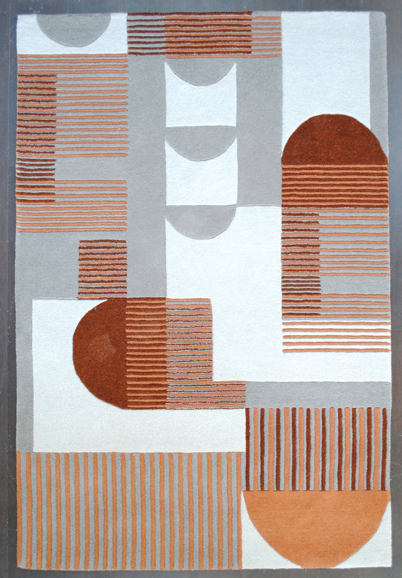 Ahmedabad hand-tufted wool rug from above: ivory ground with stone grey blocks, rust and burnt orange arches and finely striped panels, 4×6 ft