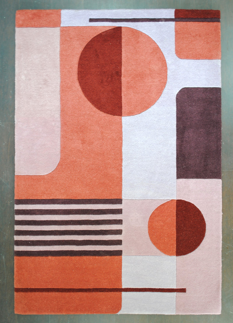 Konark hand-tufted rug in 100% New Zealand wool, full overhead view: split terracotta and rust discs among blush, lilac grey and plum blocks with fine pinstripes, Art Avenue, 4×6 ft