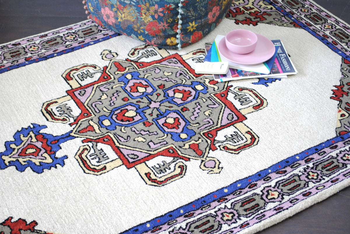 Ajmer hand-tufted wool rug with ivory, cobalt and lilac medallion