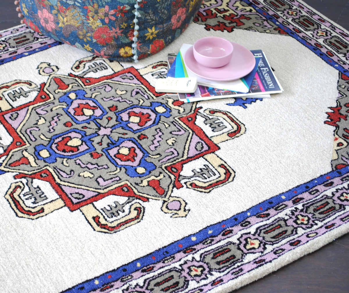 Ajmer hand-tufted wool rug with ivory, cobalt and lilac medallion
