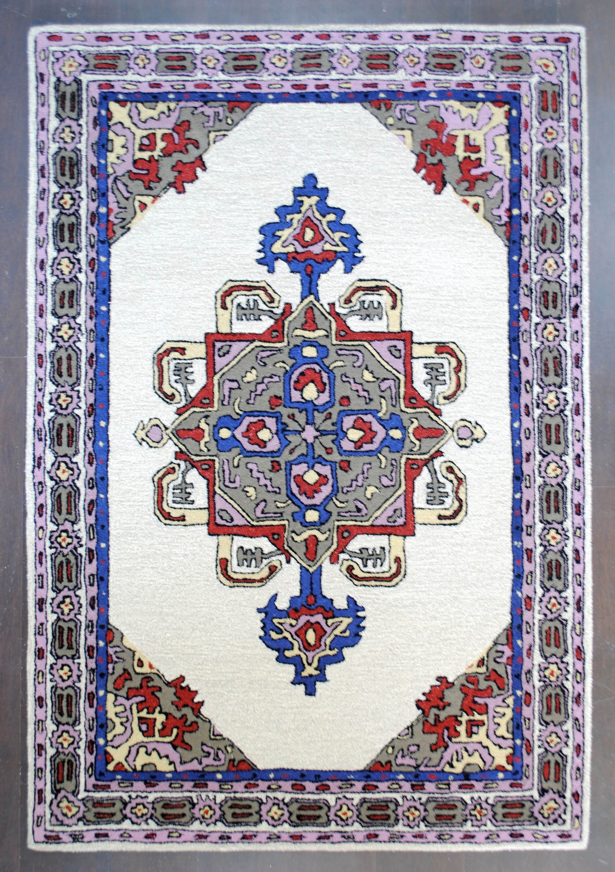 Ajmer hand-tufted wool rug with ivory, cobalt and lilac medallion