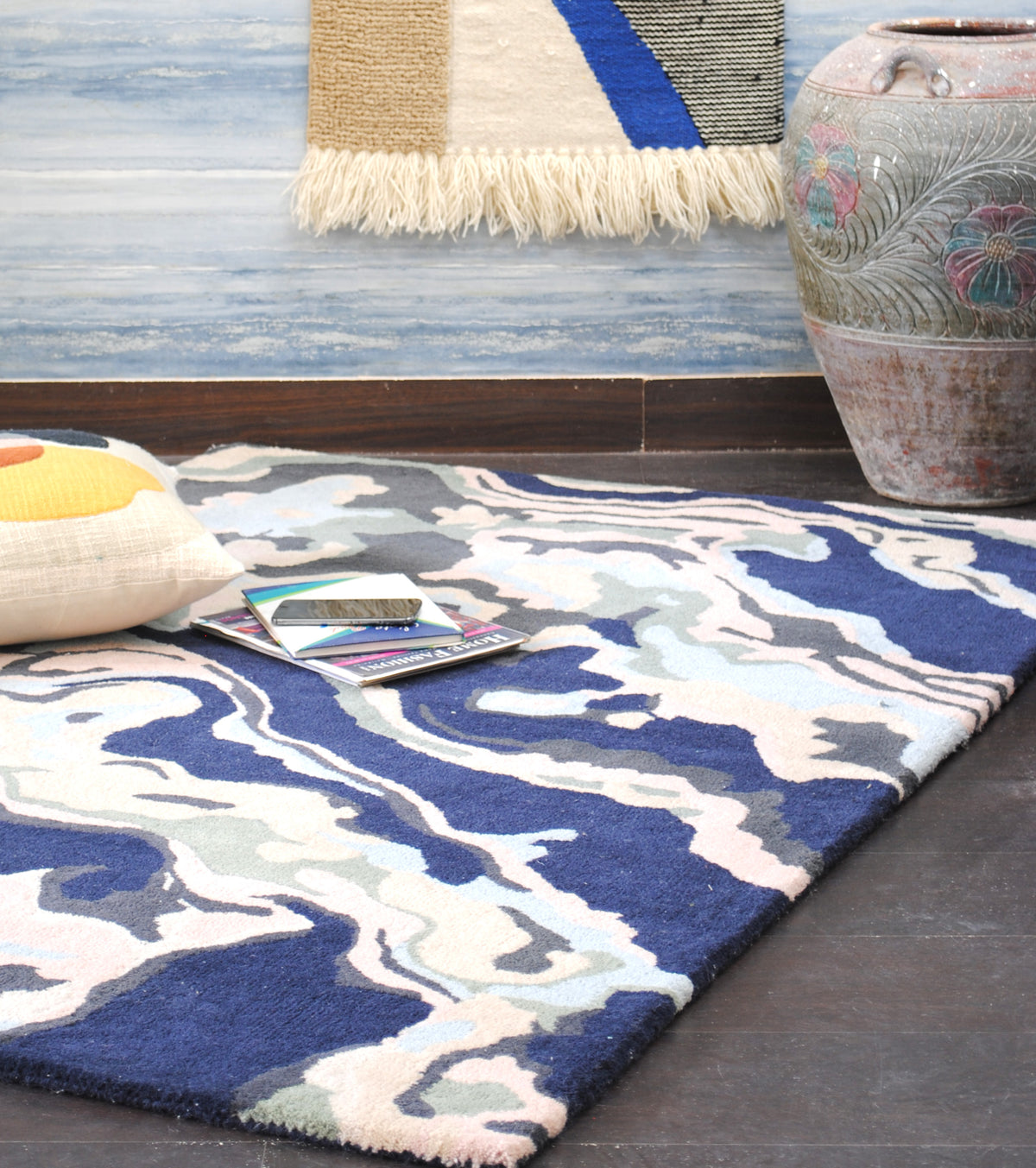 Makrana hand-tufted wool rug with marbled navy, blush and sky blue bands