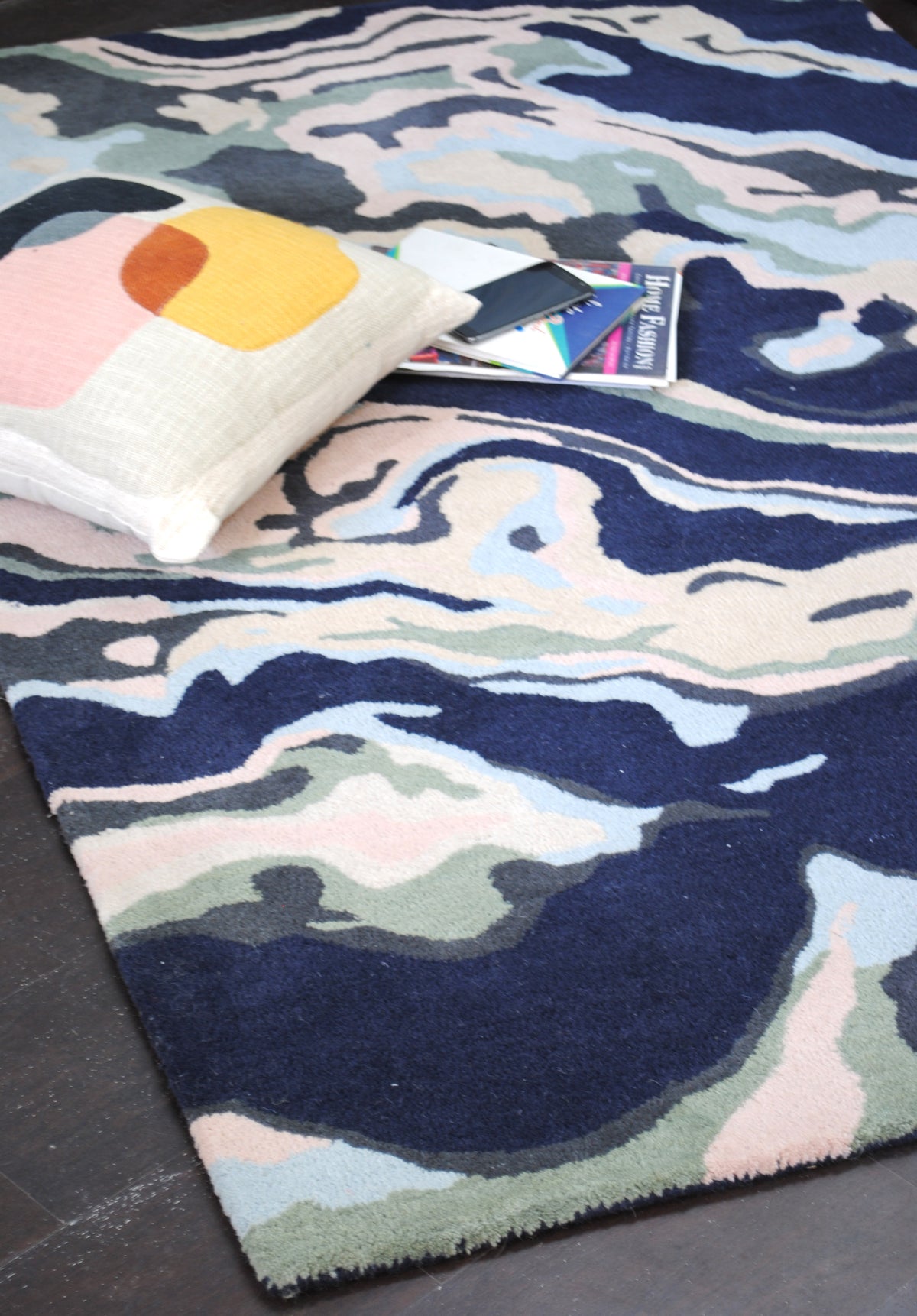 Makrana hand-tufted wool rug with marbled navy, blush and sky blue bands
