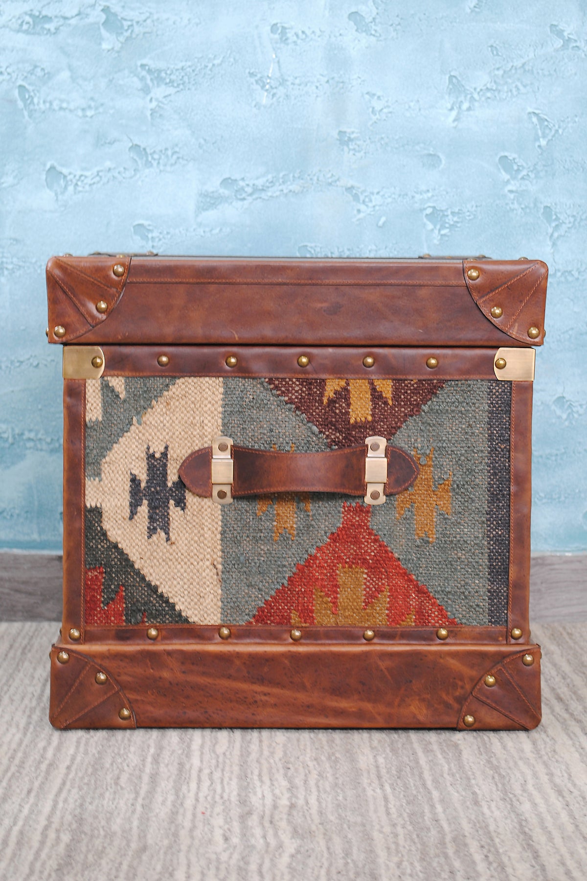 Madras kilim trunk carry handle centred on the end panel, brass mounted