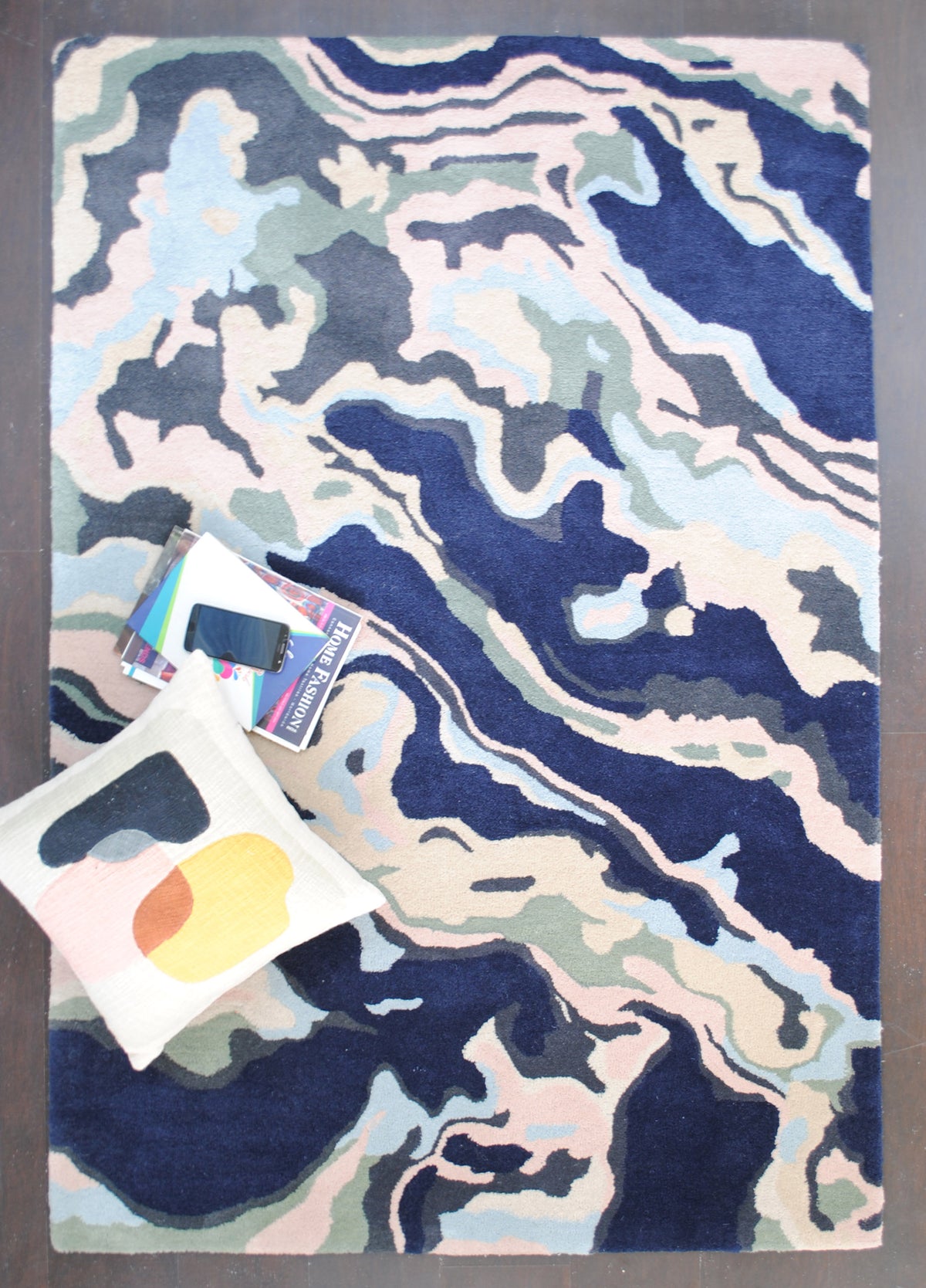 Makrana hand-tufted wool rug with marbled navy, blush and sky blue bands