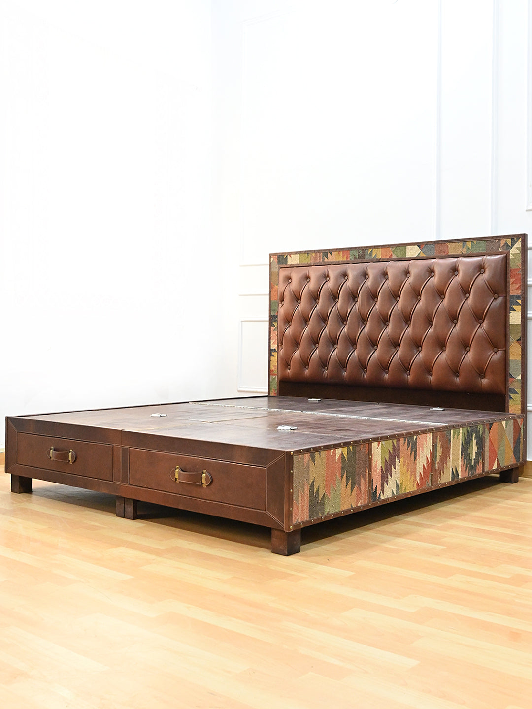 Narlai kilim and leather storage bed by Art Avenue, made to order — three-quarter view from the opposite side