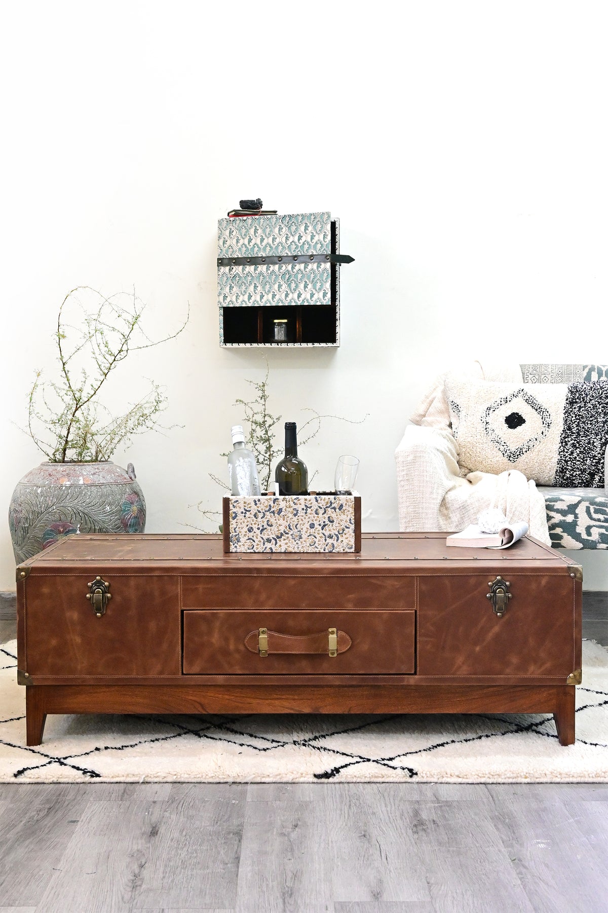 Kuchaman leather trunk coffee table styled in a living room — Art Avenue, made to order