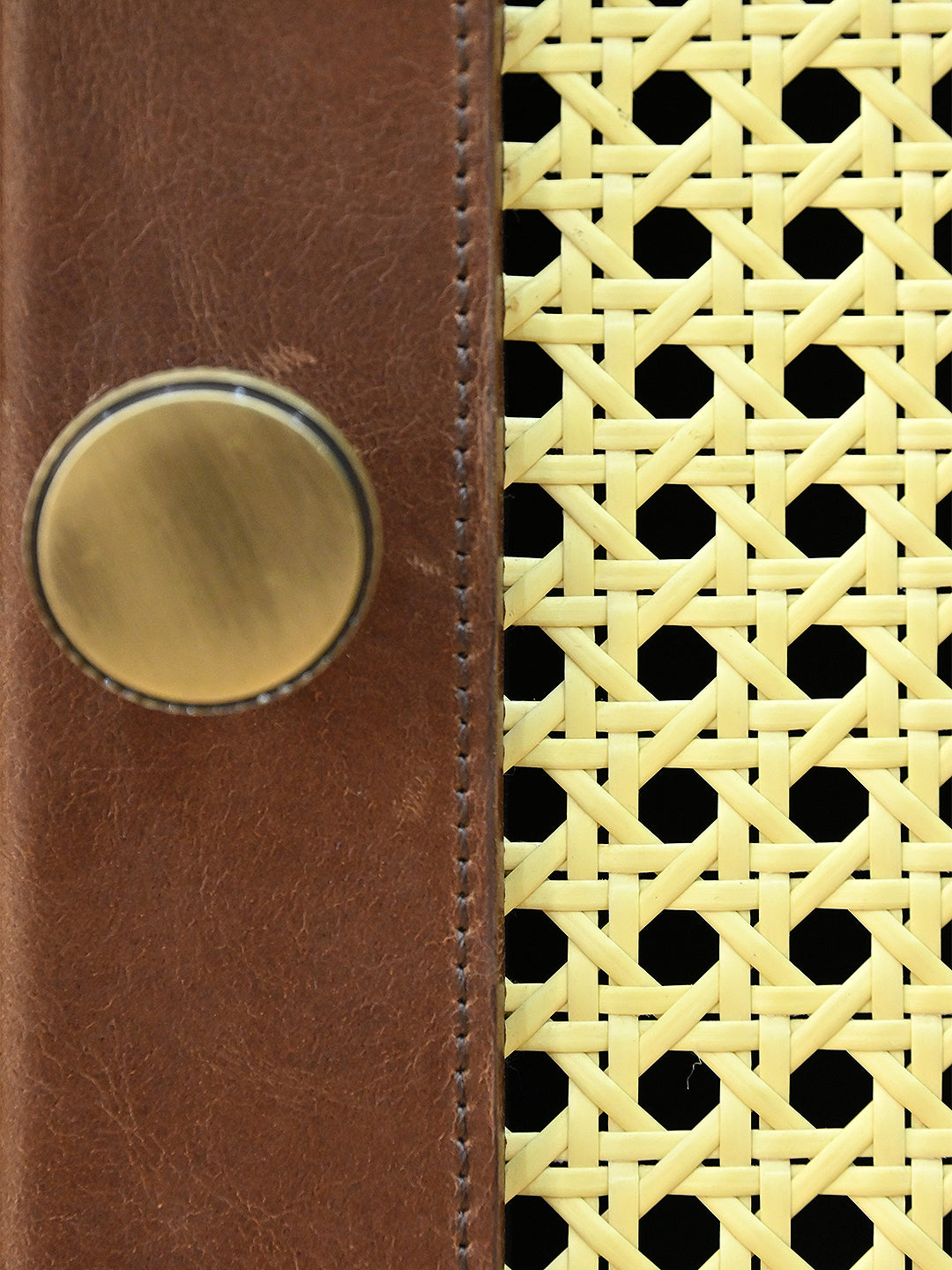 Close detail of the knurled brass knob on stitched leather, Fatehpur sideboard, Art Avenue