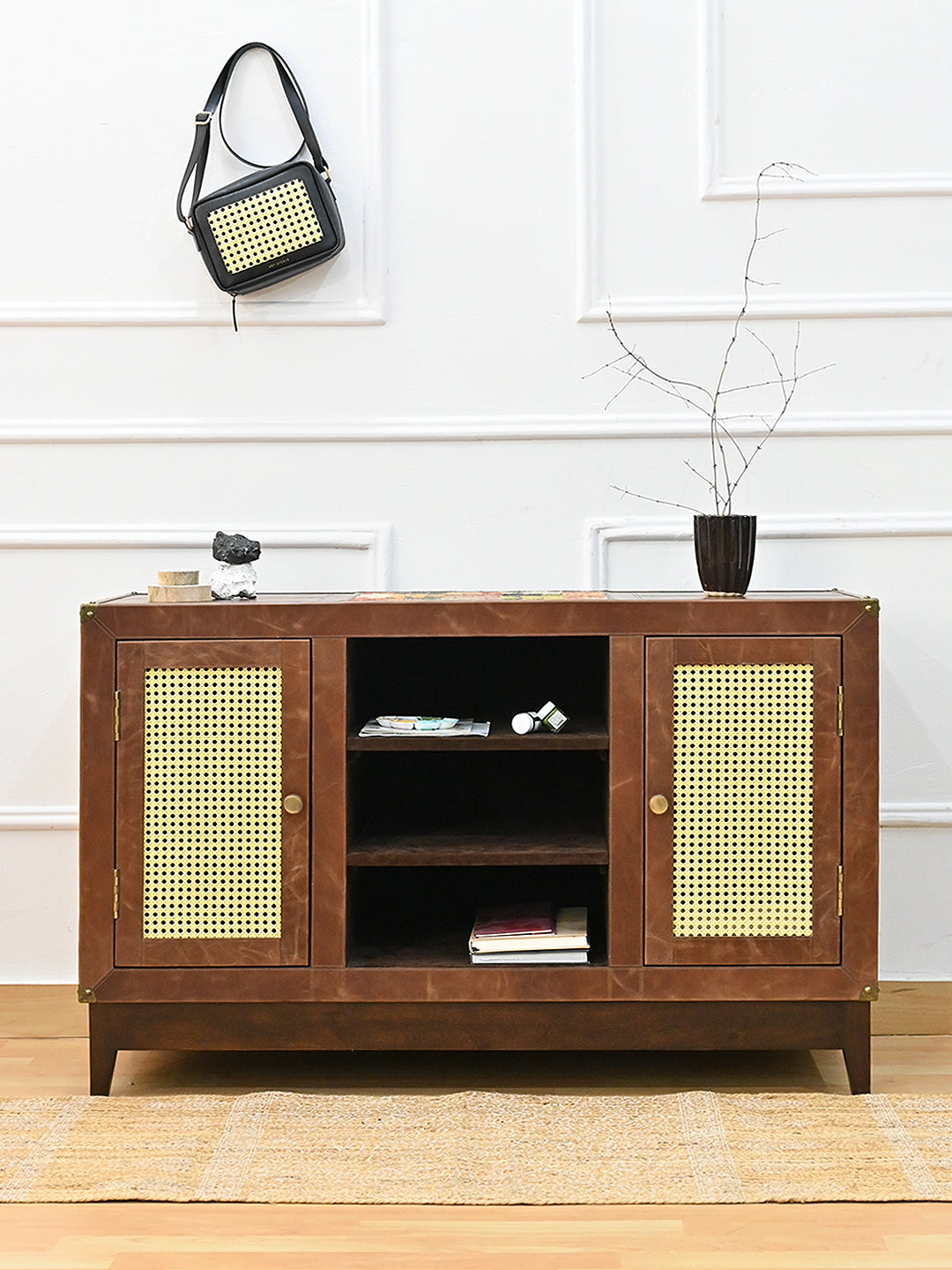 Fatehpur cane and leather sideboard styled in a panelled hallway, Art Avenue, made to order