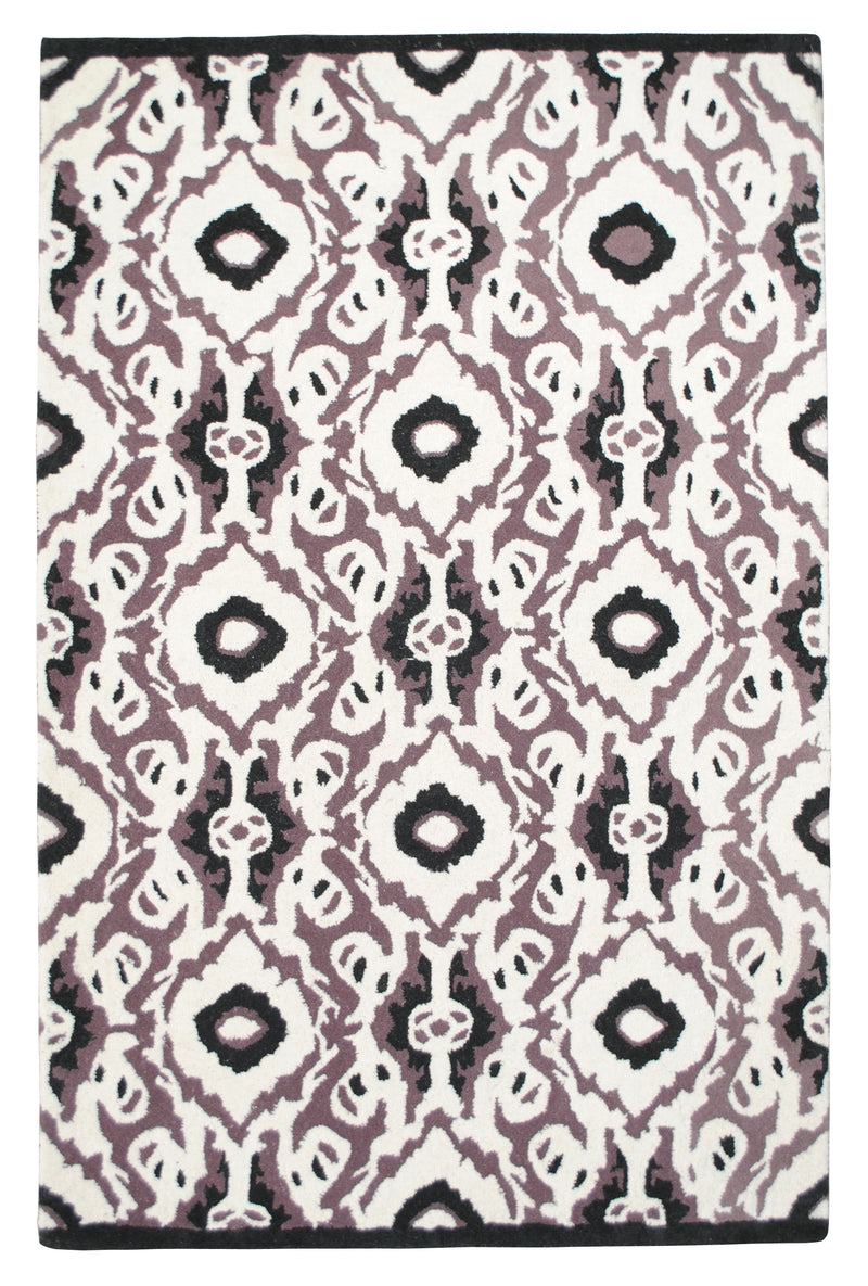 Patan hand-tufted wool rug from above: aubergine and black ikat diamonds on an ivory ground with a black edge