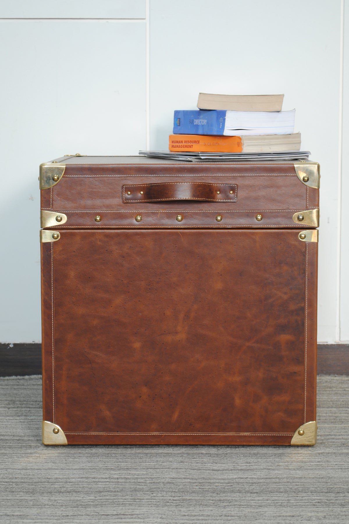 Cordoba Leather Cube Trunk, front view with leather carry handle on the lid