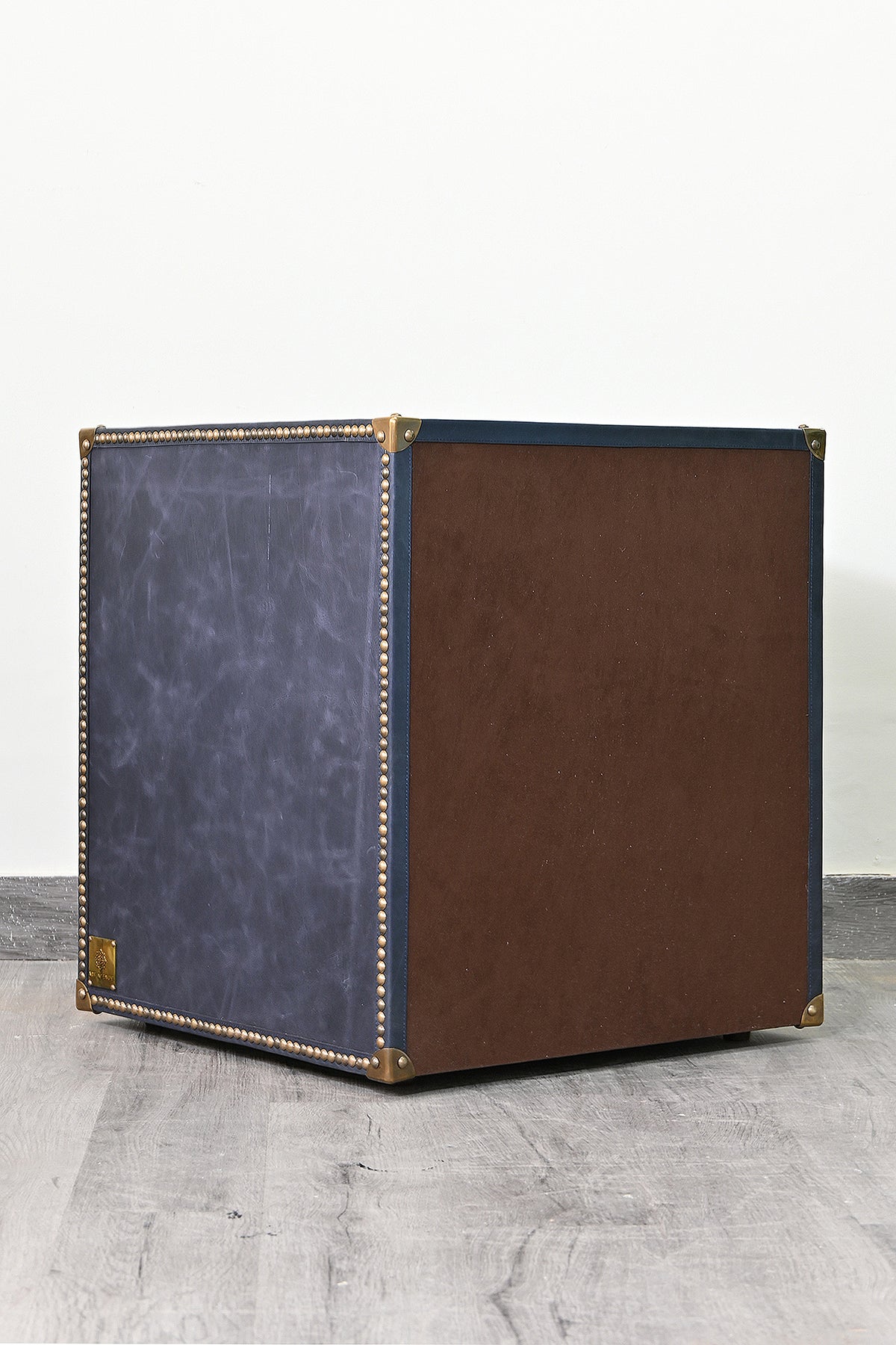 Rear three-quarter view of the Samode bedside chest showing the finished backing panel