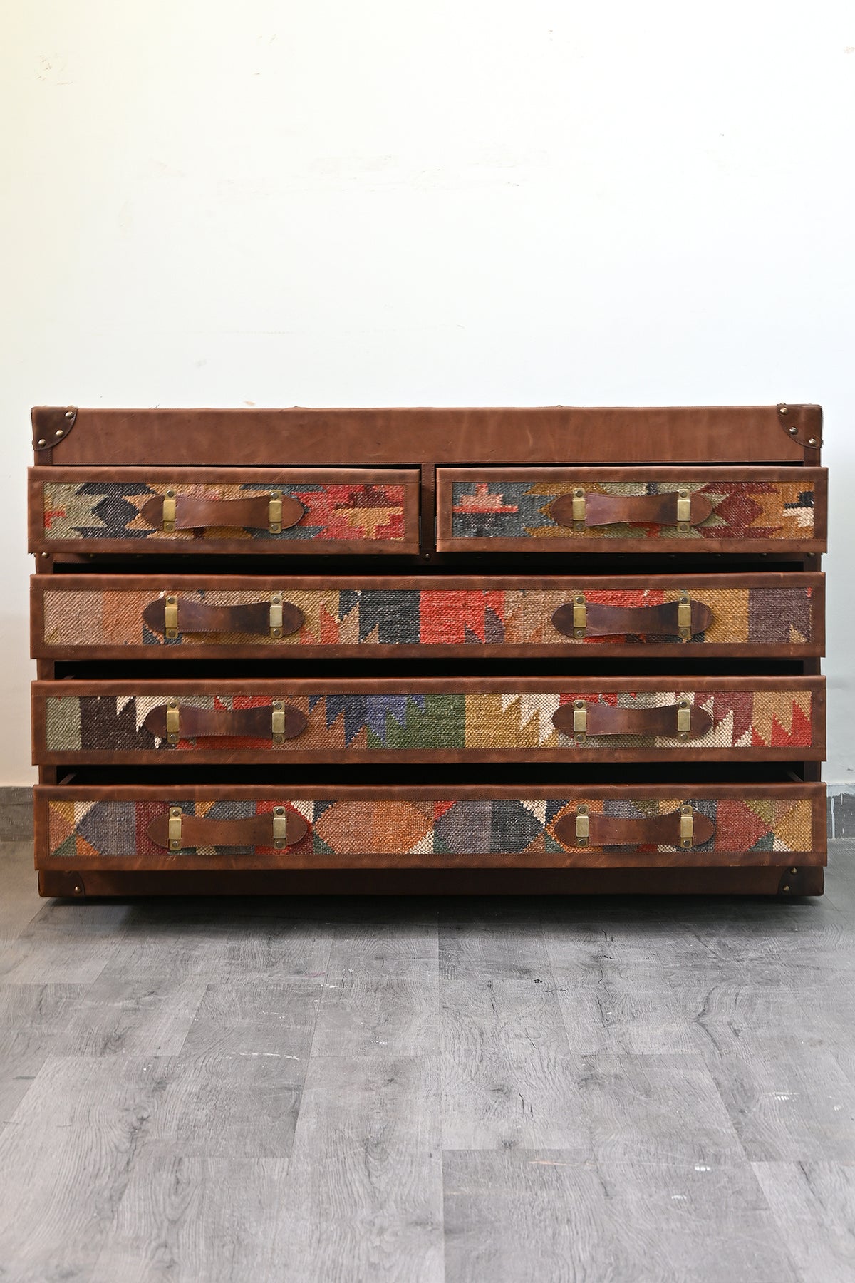 Chittor campaign chest with all five drawers eased open on their wooden side rails