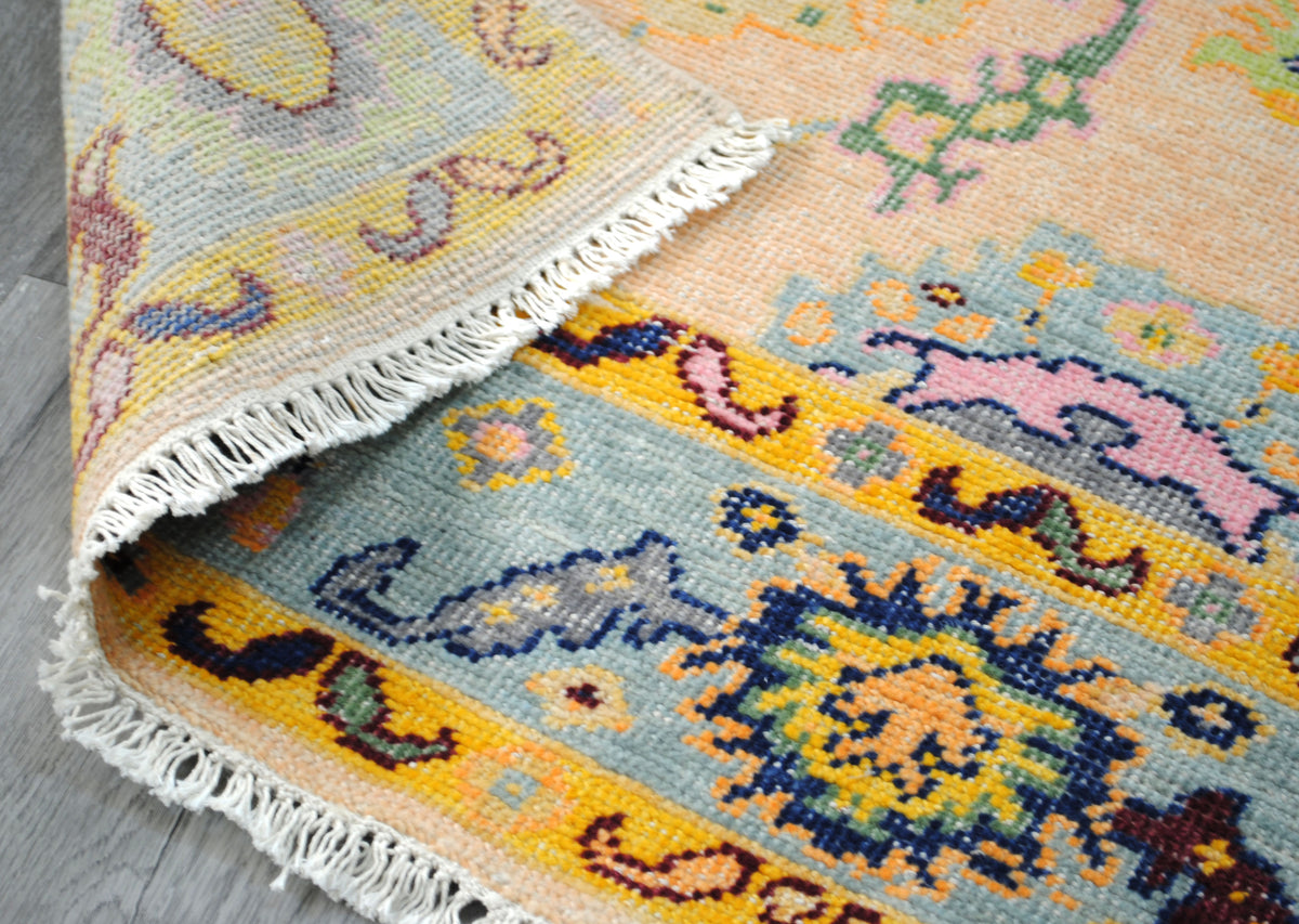 Mysore Hand-Knotted Rug folded back to show the design knotted through to the reverse, proof of hand-knotting — Art Avenue