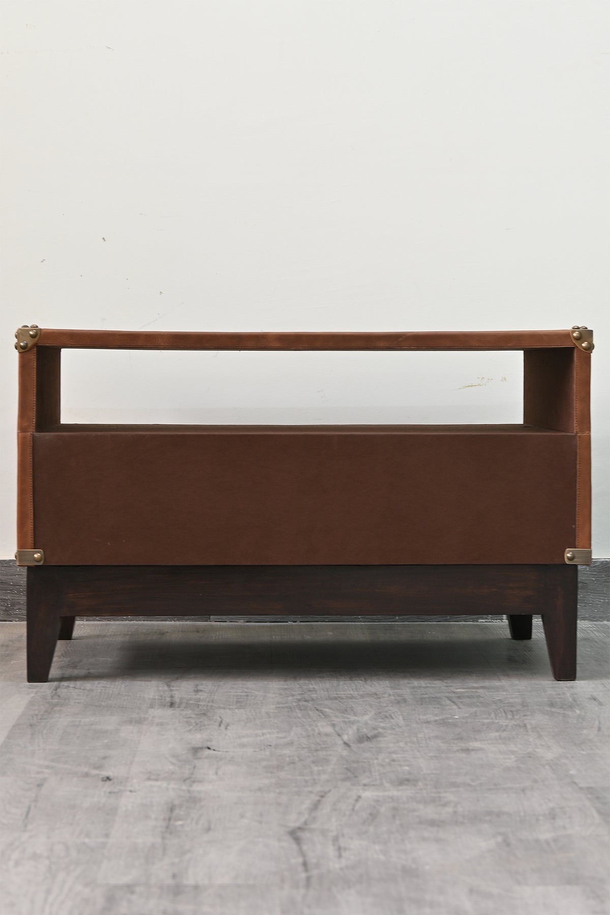 Detail of the leather rail above the open bay on the Barmer TV unit