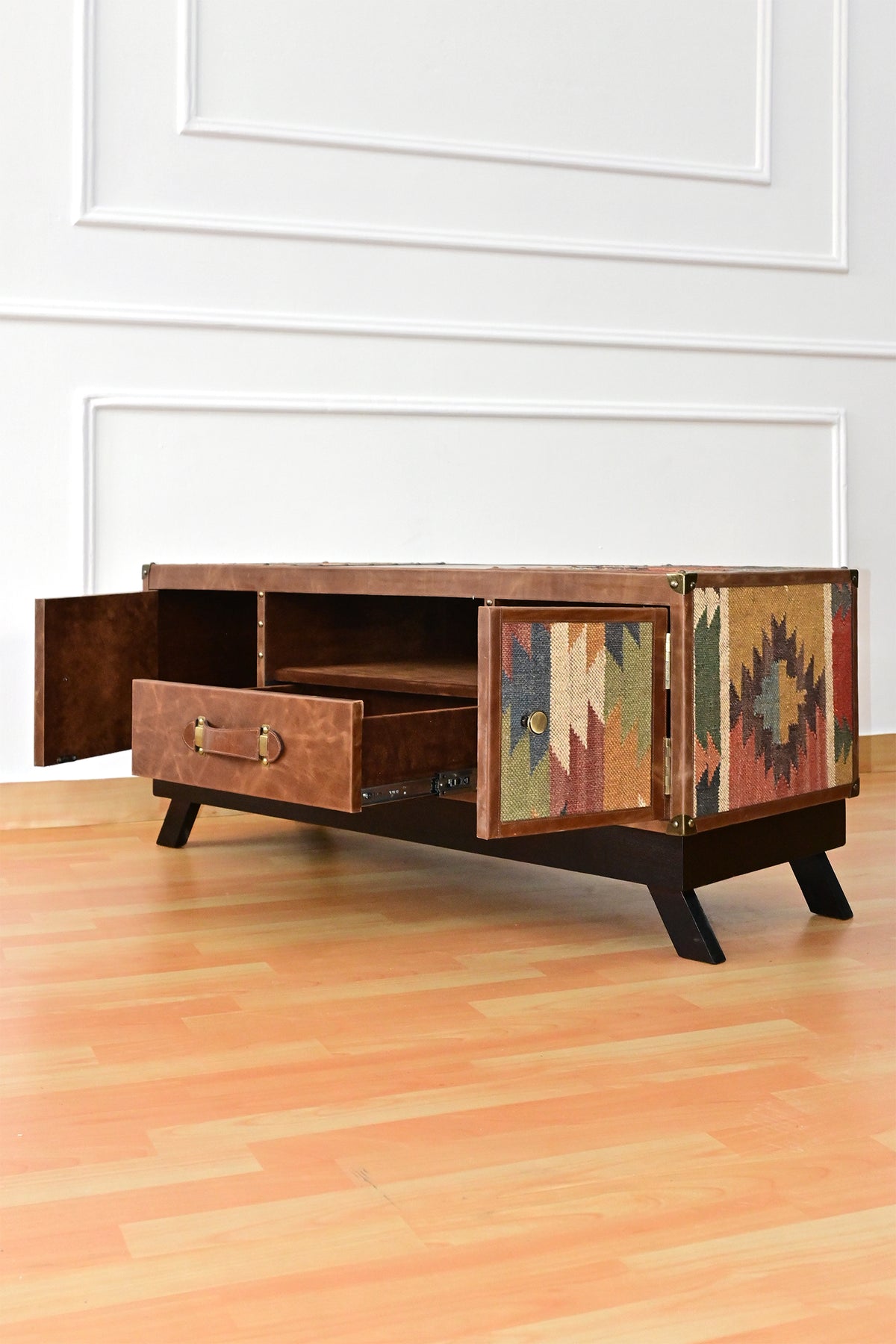 Karauli TV unit with one cupboard door open and the drawer extended on its runners