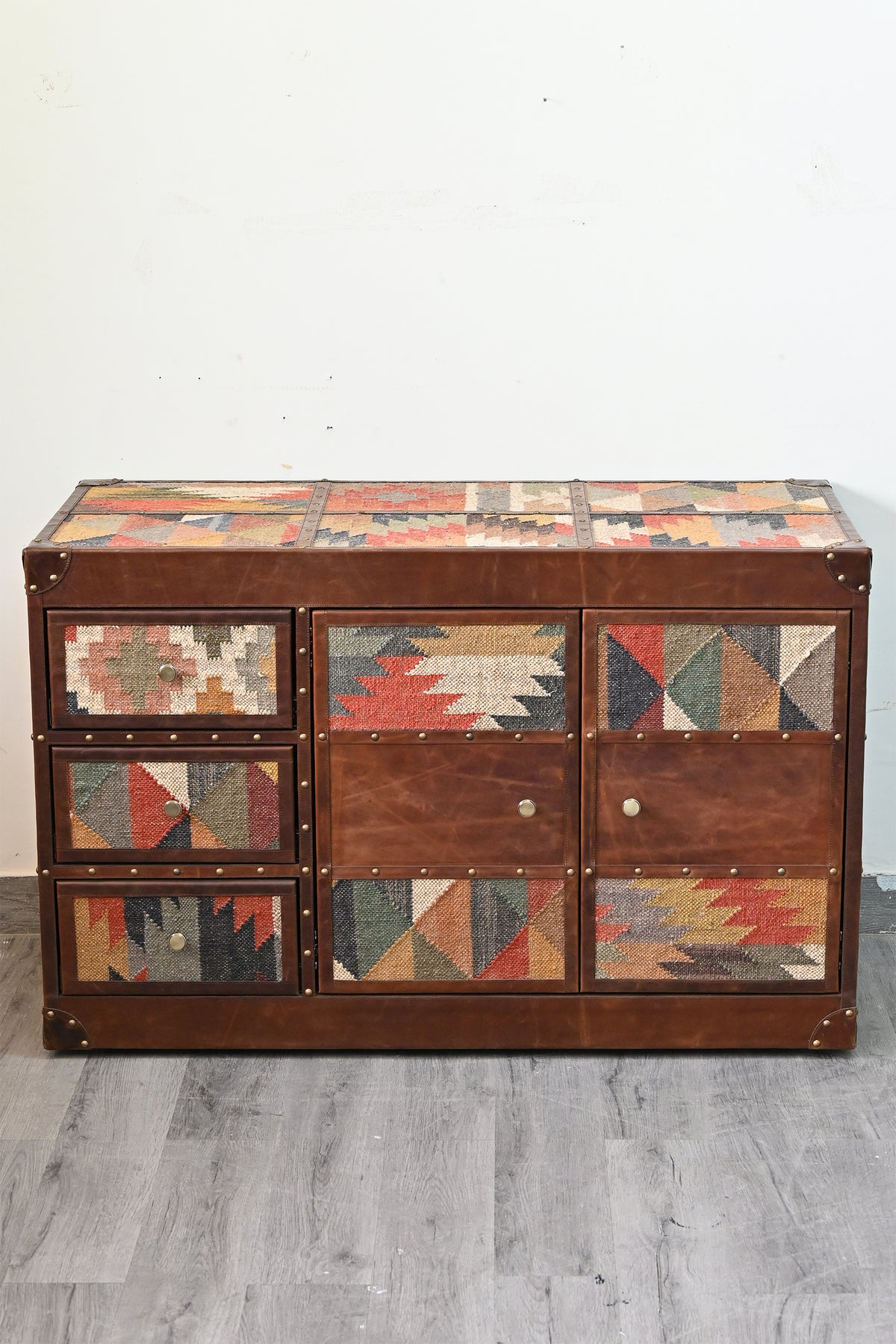 Nimaj Kilim & Leather Sideboard, front view with the six-panel kilim top, three kilim drawers and two tiered cupboard doors — Art Avenue, made to order