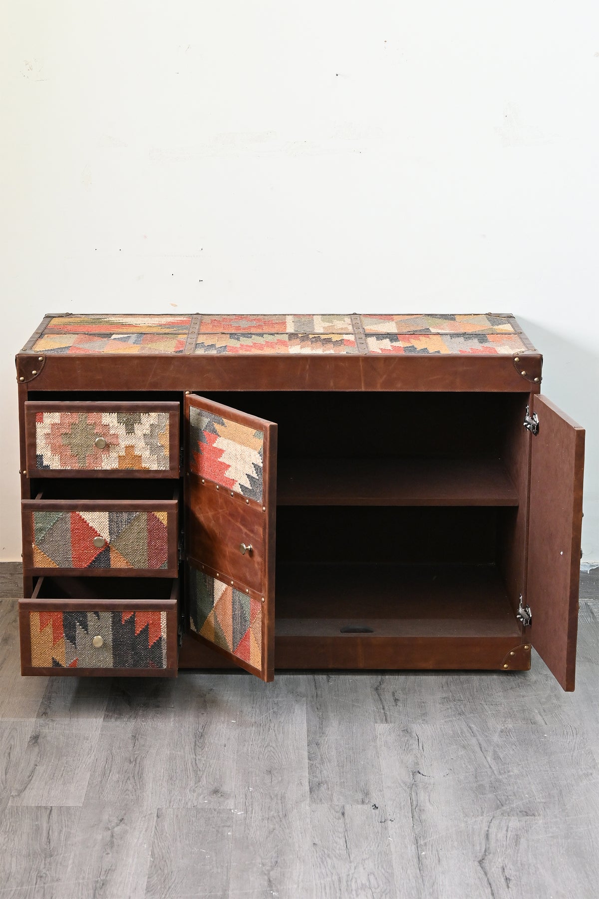 Nimaj sideboard with three drawers pulled out and both doors open to a full-width shelved compartment — Art Avenue, made to order
