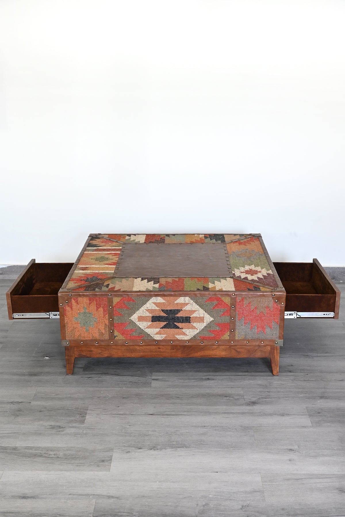 Mandawa coffee table with both opposing drawers pulled fully open