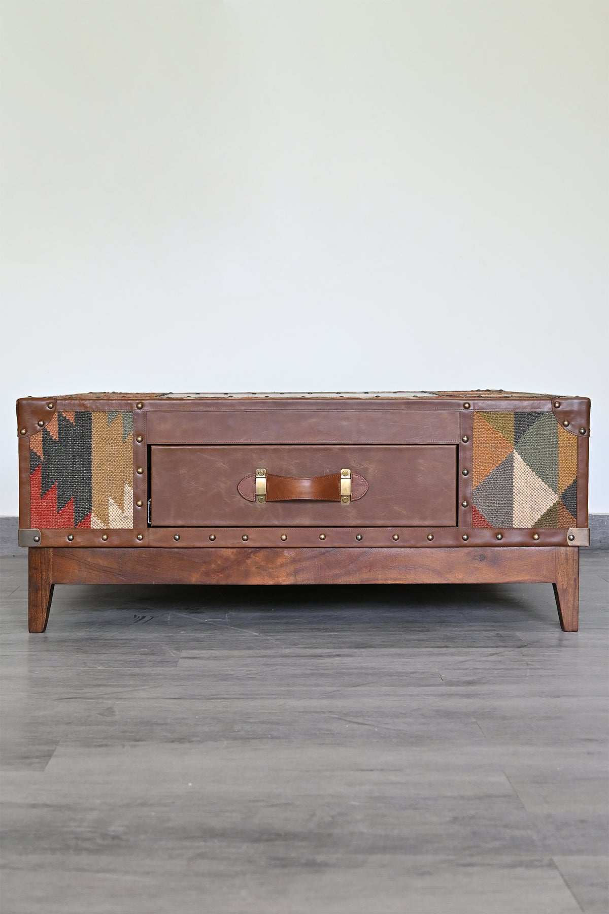 Second drawer face of the Mandawa coffee table showing leather front and kilim sides