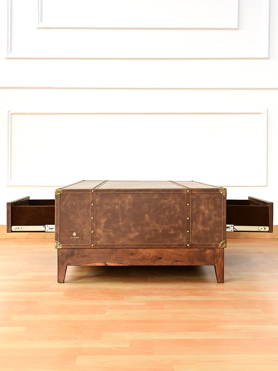 Nawalgarh leather trunk coffee table, end view with both drawers extended on soft-close runners