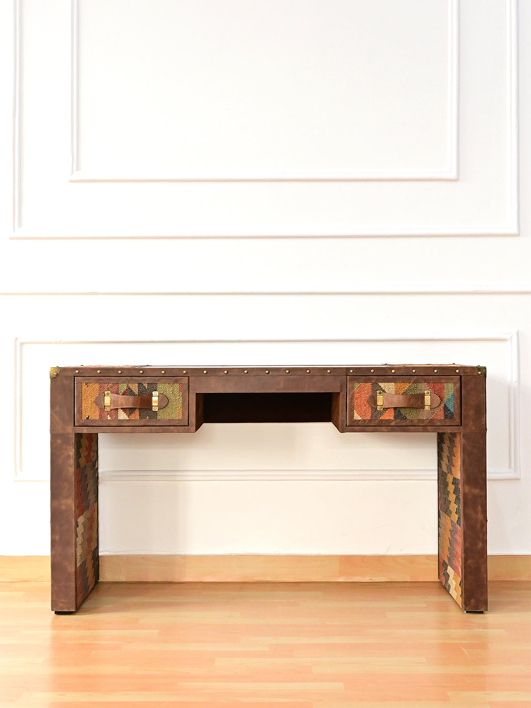 Dungarpur kilim and leather writing desk from the front, two kilim-faced drawers either side of an open recess