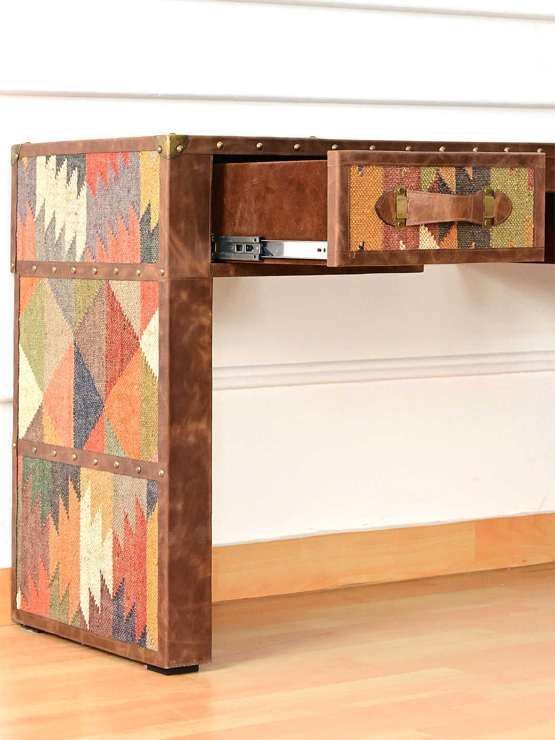 Kilim leg of the Dungarpur desk with one drawer open on its runner