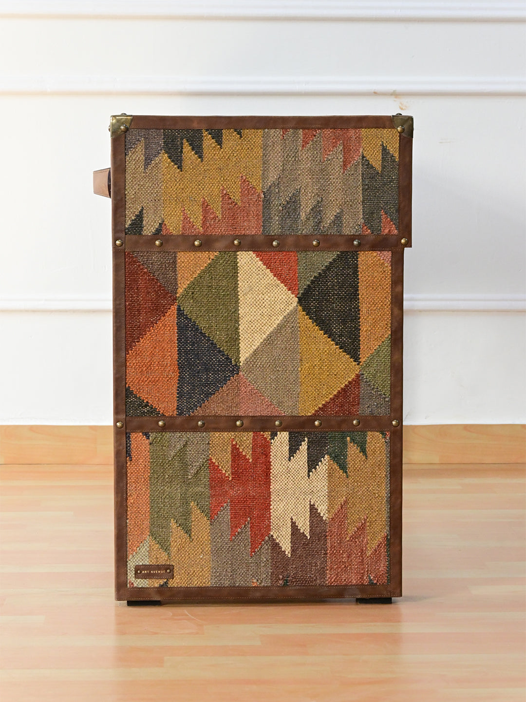 End view of the Dungarpur desk showing the banded kilim leg panels