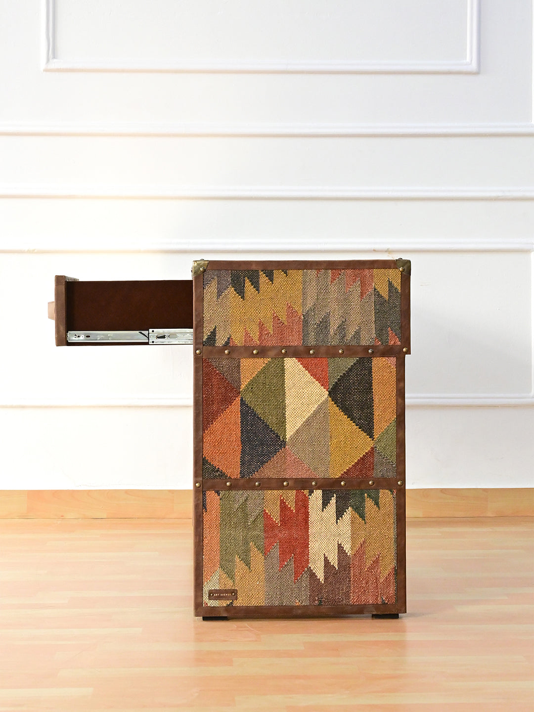 Art Avenue leather label on the kilim leg of the Dungarpur desk