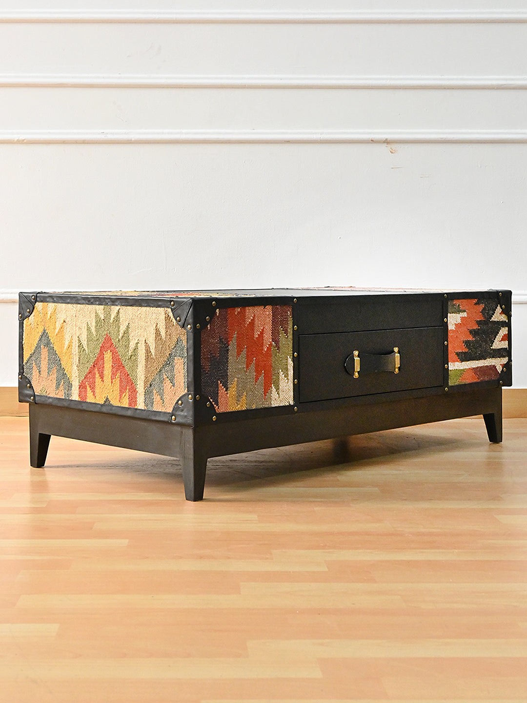 Kumbhalgarh coffee table from the opposite corner, with a kilim short end, kilim flank panels and a strap-handled drawer